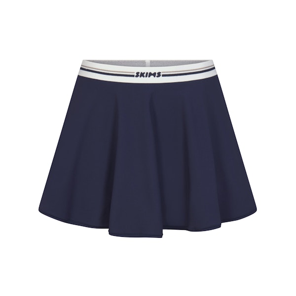 FITS EVERYBODY LOGO SKORT | NAVY (SKIRTS, BOTTOMS) LAYS FLAT ON A WHITE BACKGROUND | FLT
