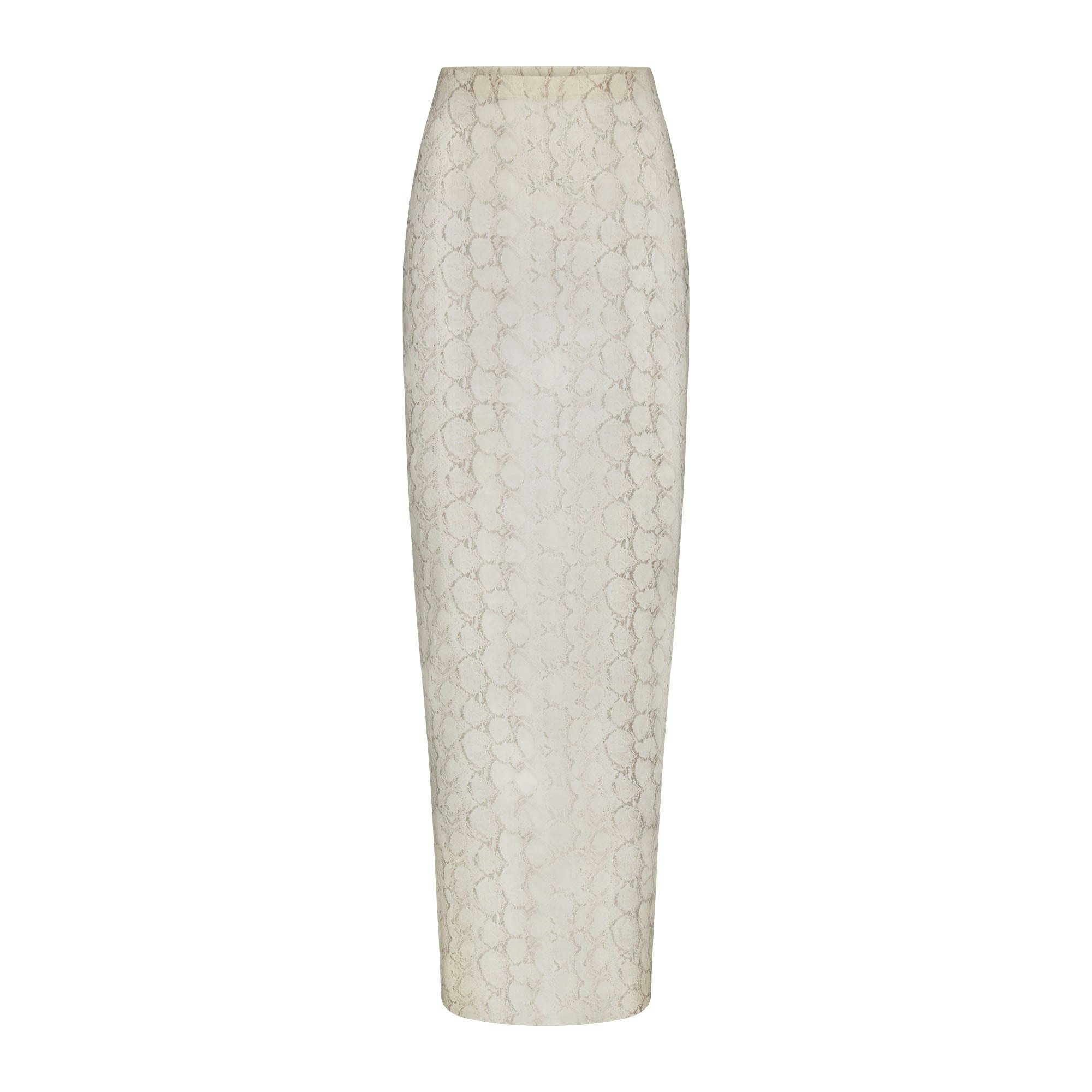 MILKY SHEER LONG SKIRT | STONE PASTEL SNAKE PRINT FLAT ON A WHITE BACKGROUND | FLT