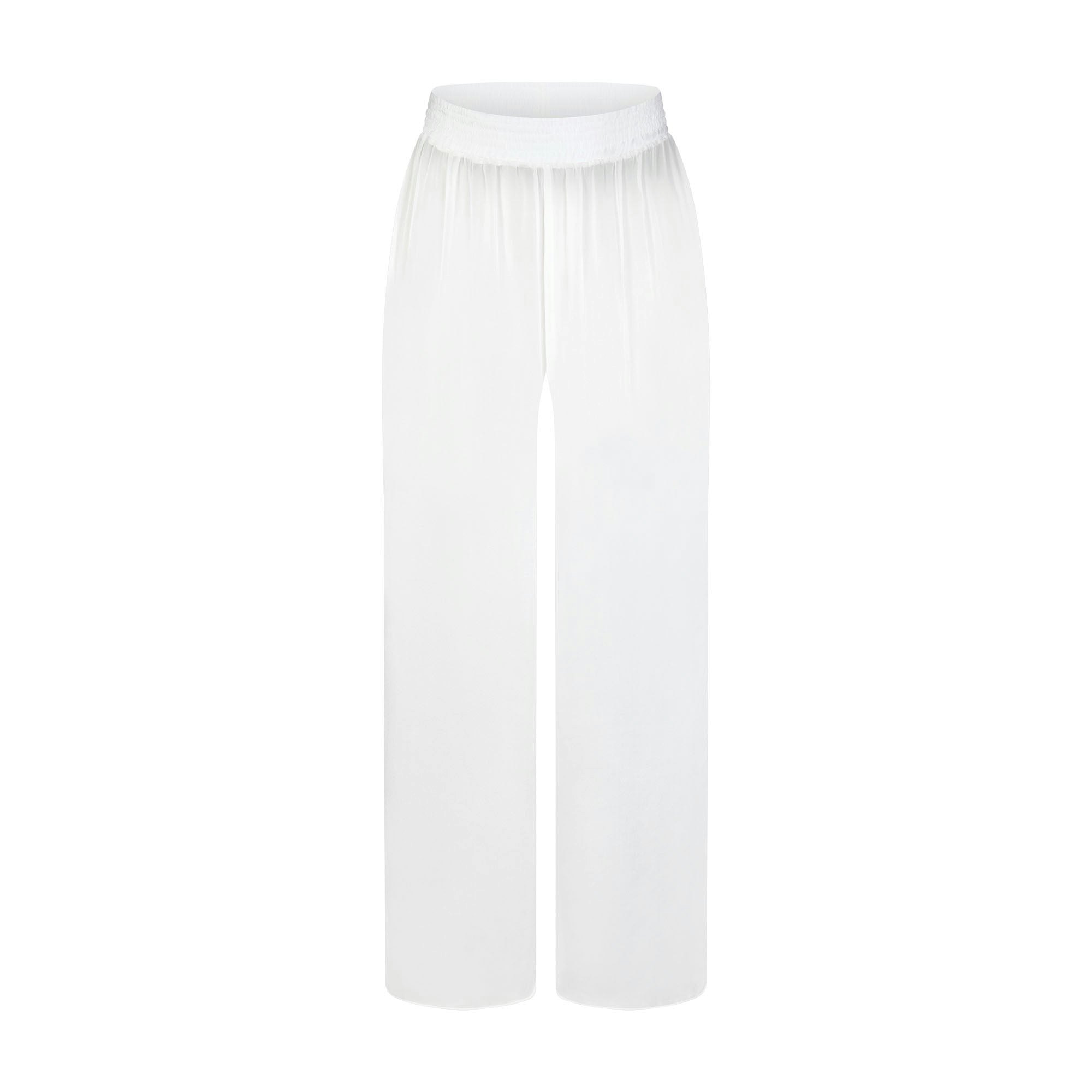 SKIMS ROMANCE SMOCKED PANT | SNOW (PANTS, BOTTOMS) LAYS FLAT ON A WHITE BACKGROUND | FLT