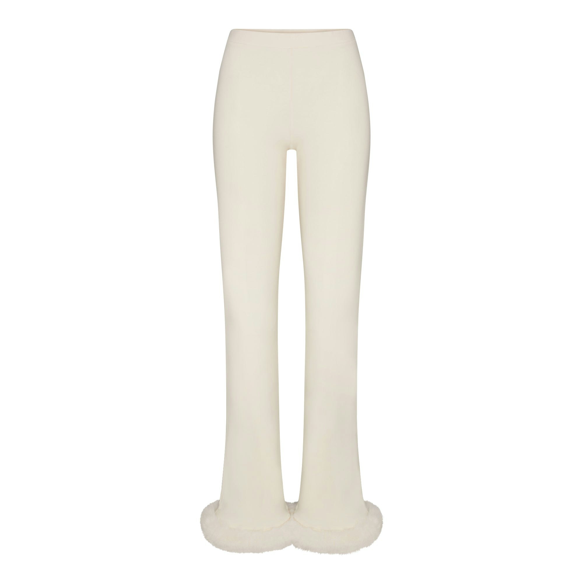 SKIMS CLOUD SLIM FLARE PANT | ECRU FLAT ON A WHITE BACKGROUND | FLT
