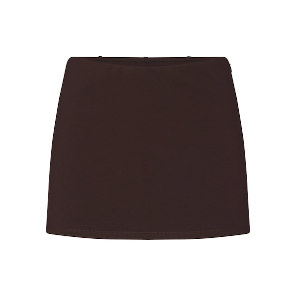 THE ESSENTIAL COLLECTION MINI SKORT | ESPRESSO FLAT ON A WHITE BACKGROUND | FLT