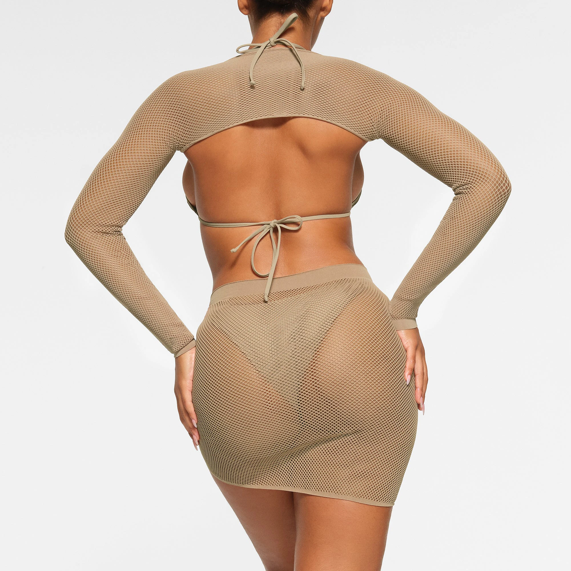 WARP KNIT COVER UP RUCHED SARONG WORN BY A MODEL IN BACK VIEW