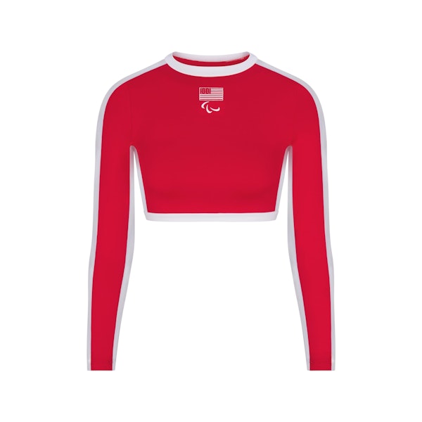 SKIMS FOR TEAM USA SIGNATURE SWIM PARALYMPIC LONG SLEEVE CROPPED T-SHIRT | RED (CROP TOPS, TOPS) FLAT ON A WHITE BACKGROUND | FLT