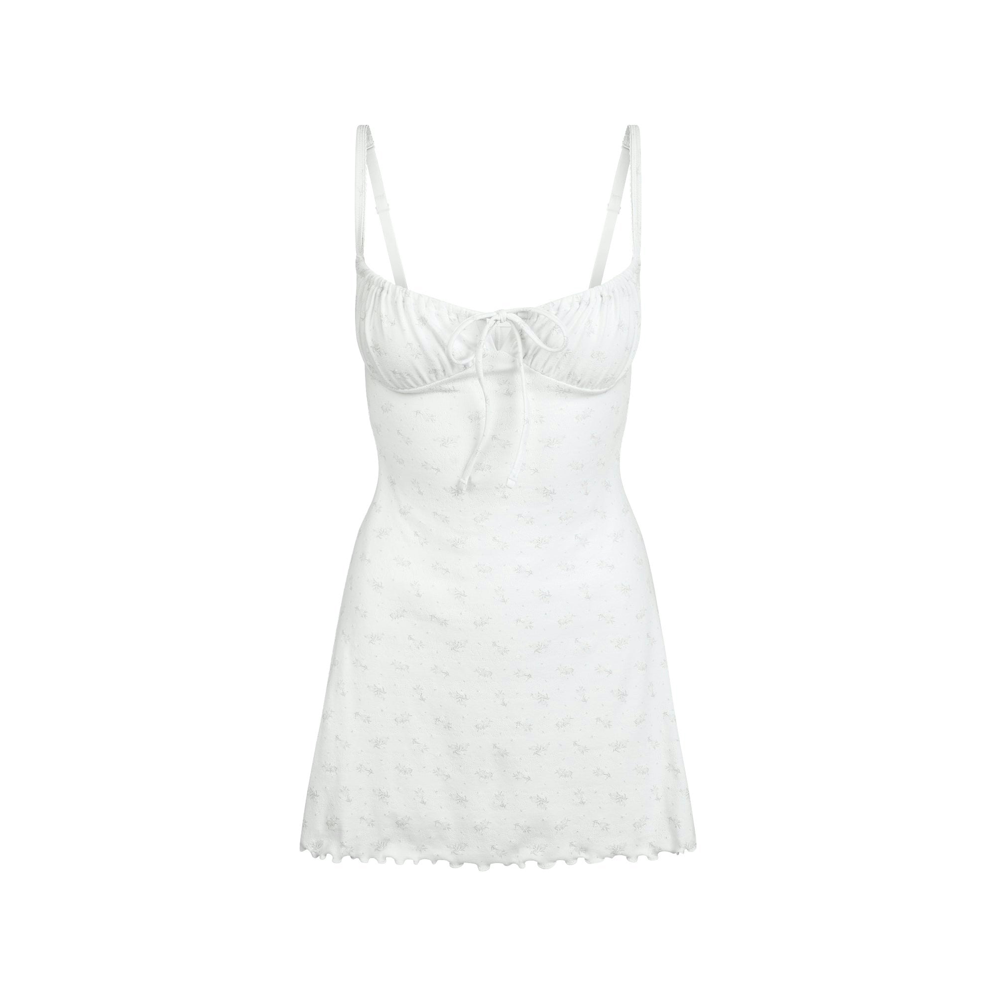 LOGO POINTELLE MINI DRESS | PACIFIC FLORAL PRINT FLAT ON A WHITE BACKGROUND @ | FLT