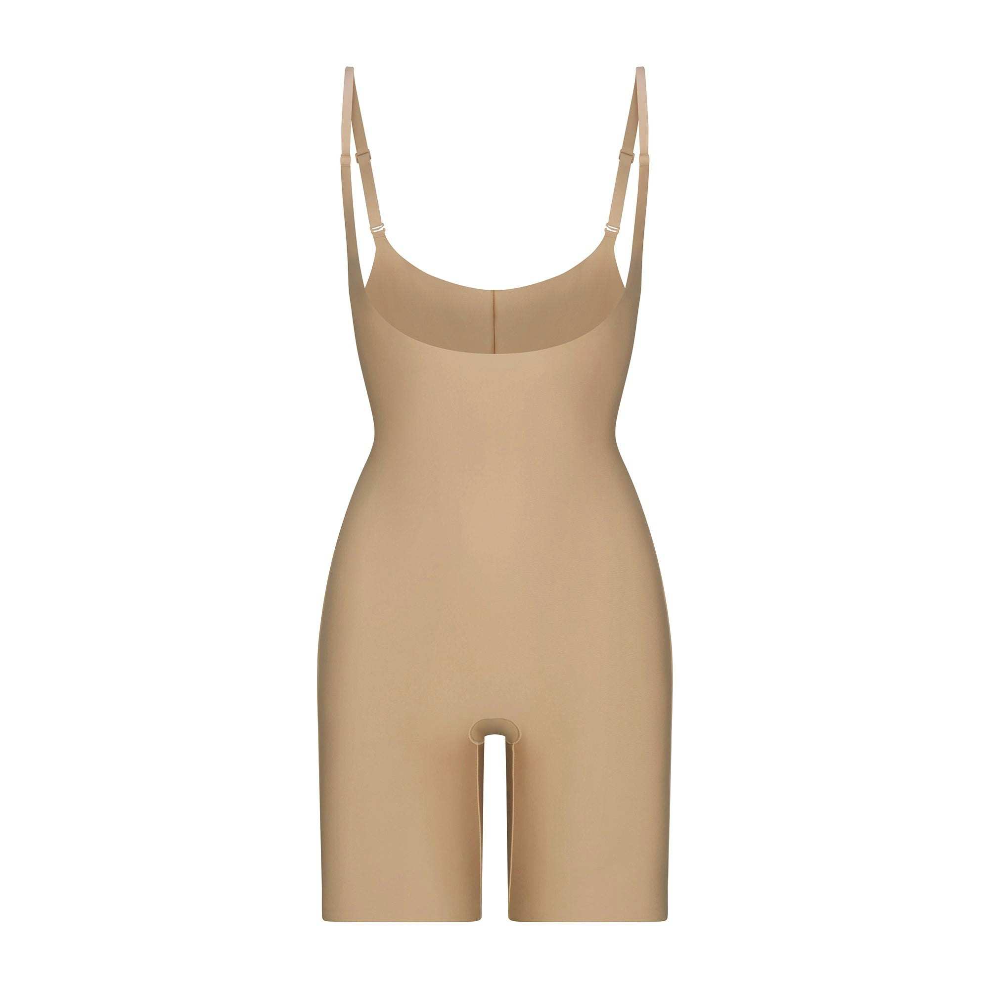 SKIMS BODY BUTT ENHANCING OPEN BUST BODYSUIT | CLAY FLAT ON A WHITE BACKGROUND | FLT | FLT