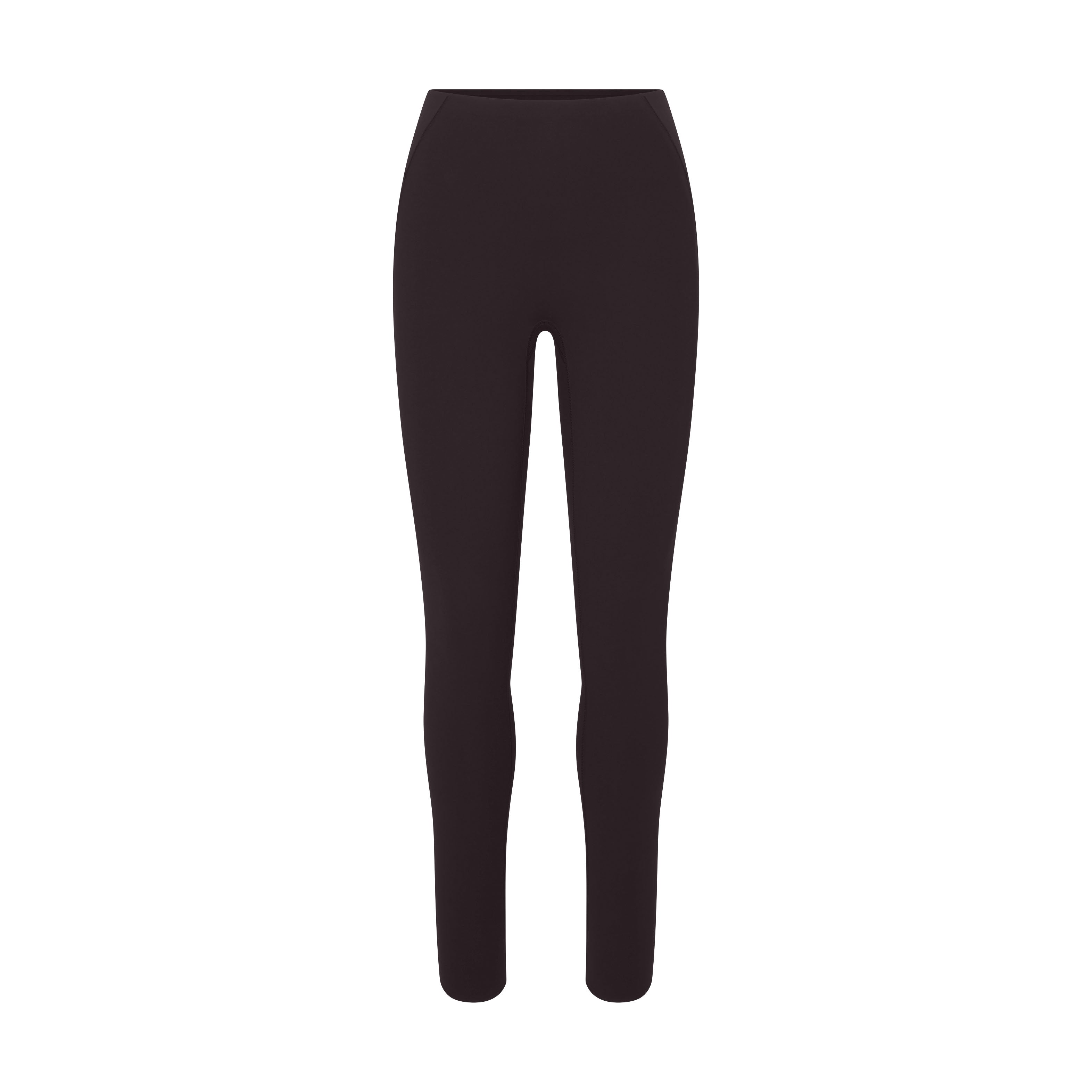 NikeSKIMS STUDIO STRETCH 26" LEGGING | DARK ROAST LAYS FLAT ON A WHITE BACKGROUND | FLT