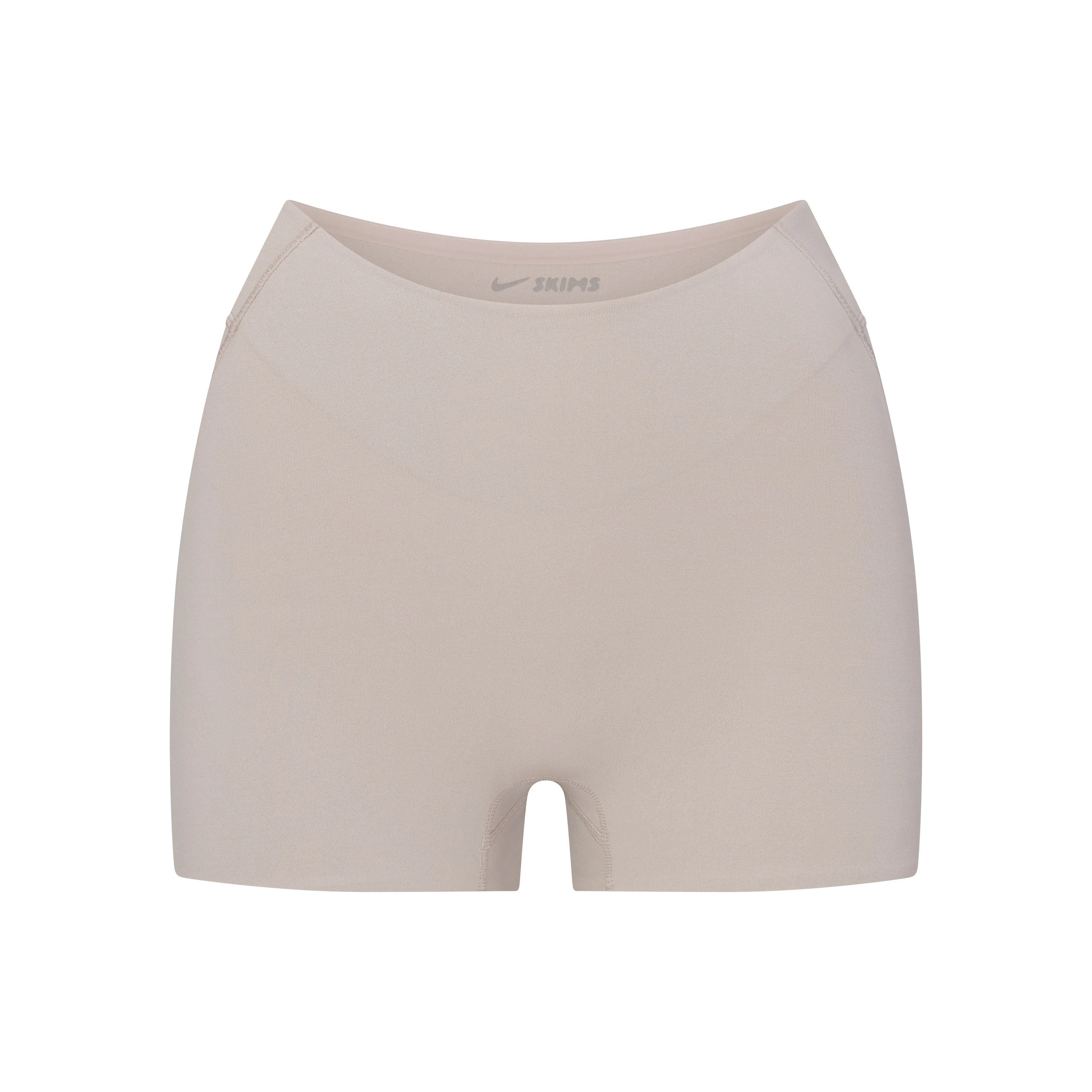 NikeSKIMS STUDIO STRETCH DIP FRONT 2" SHORT | LINENLAYS FLAT ON A WHITE BACKGROUND | FLT