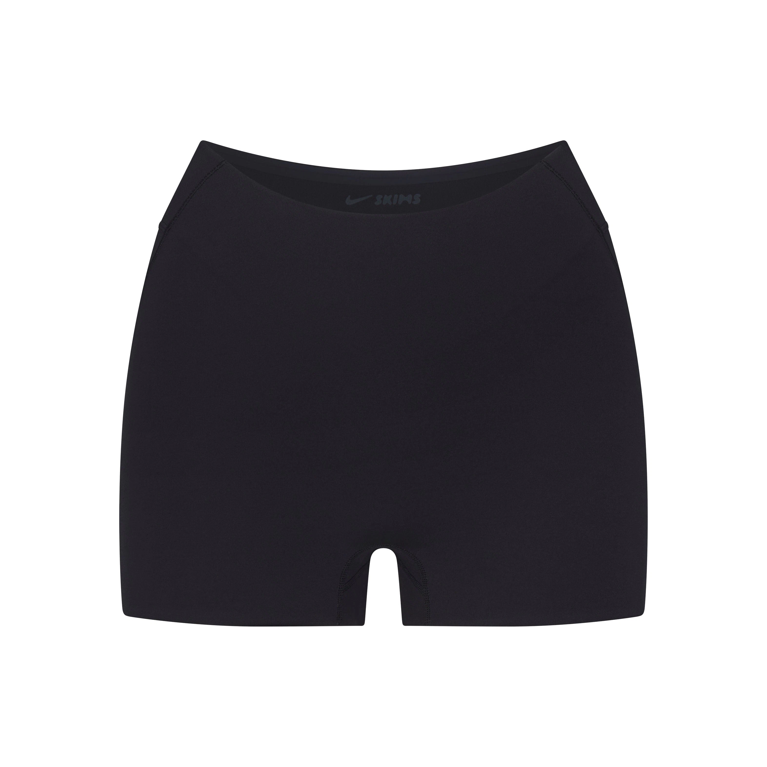 NikeSKIMS STUDIO STRETCH DIP FRONT 2" SHORT | OBSIDIANLAYS FLAT ON A WHITE BACKGROUND | FLT