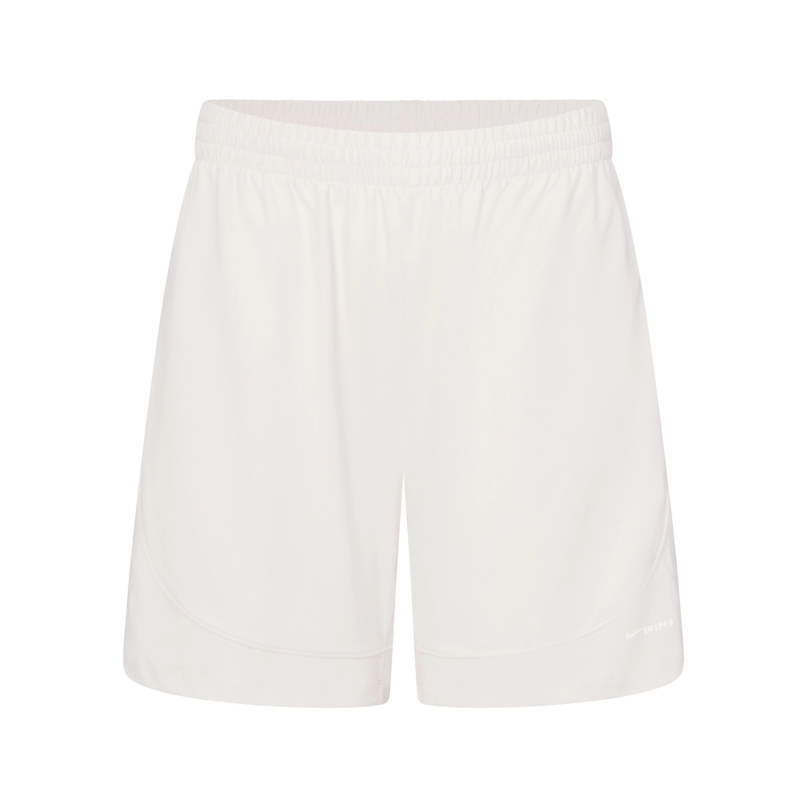 NikeSKIMS AIRY RELAXED SHORT | IVORY LAYS FLAT ON A WHITE BACKGROUND | FLT