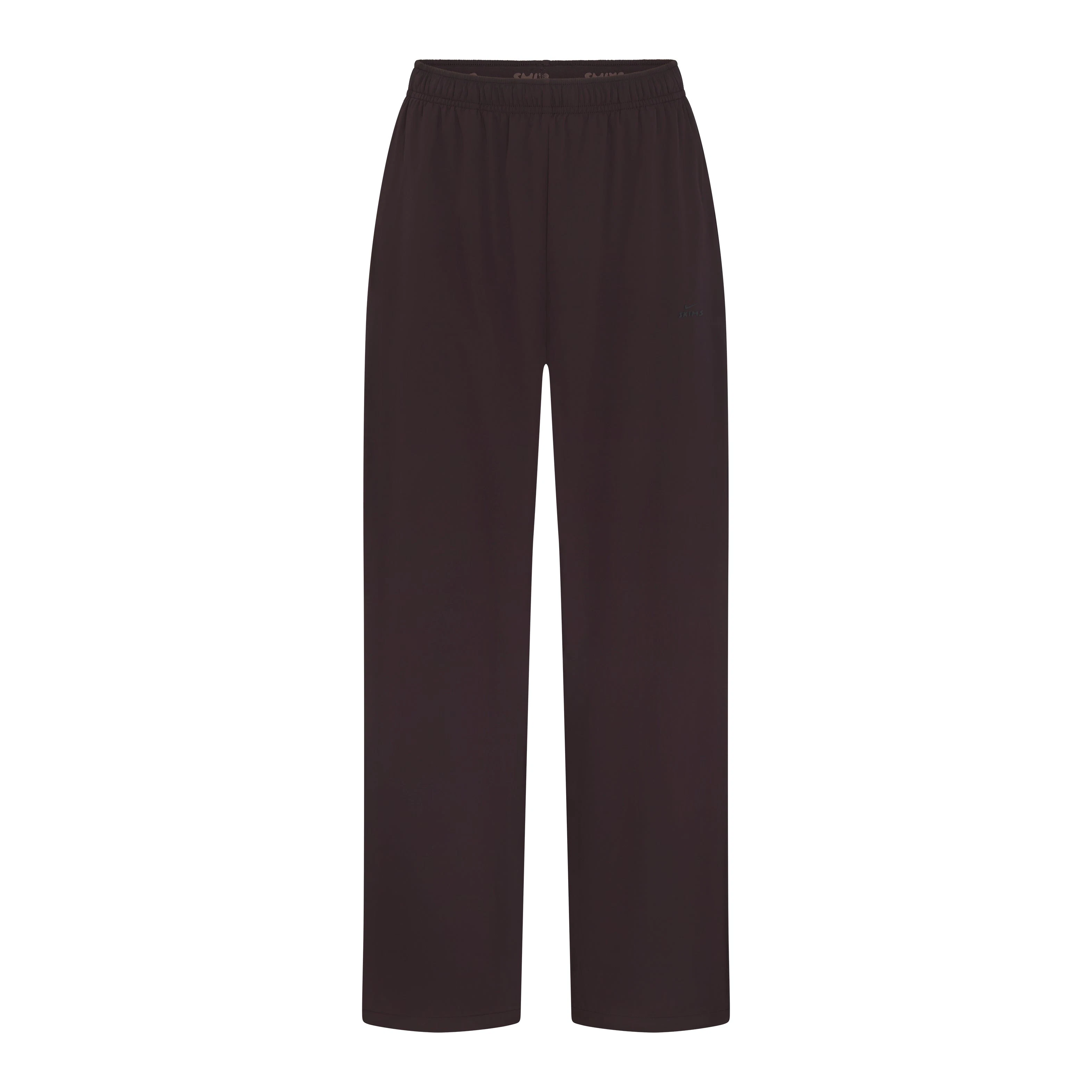 NikeSKIMS STRETCH NYLON OVERSIZED PANT | DARK ROAST & LAYS FLAT ON A WHITE BACKGROUND | FLT