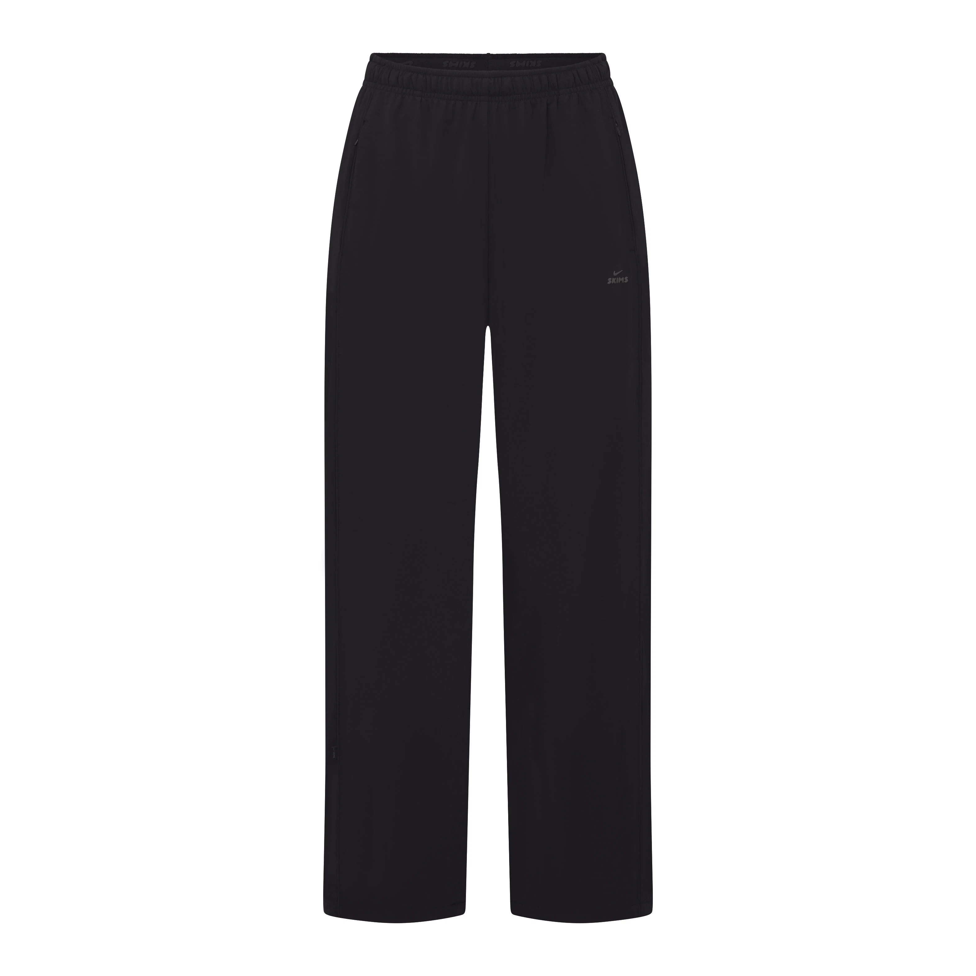 NikeSKIMS STRETCH NYLON OVERSIZED PANT | OBSIDIAN LAYS FLAT ON A WHITE BACKGROUND | FLT