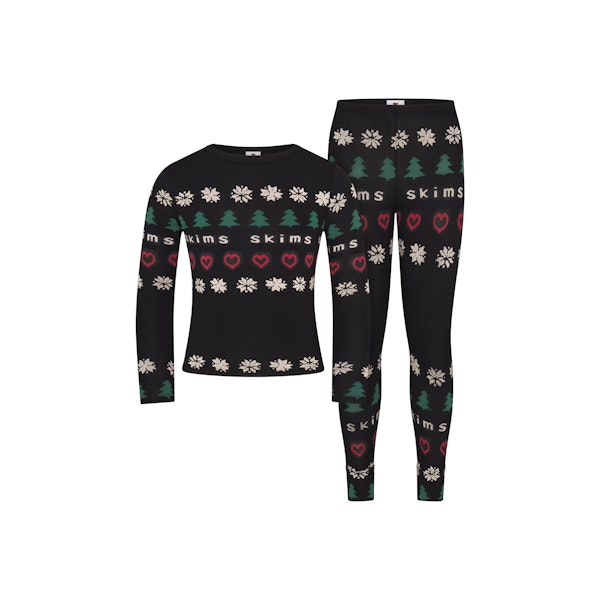 CACTUS PLANT FLEA MARKET X SKIMS SKIMS SLEEP KIDS SET | ONYX PINE FAIR ISLE FLAT ON A WHITE BACKGROUND | FLT