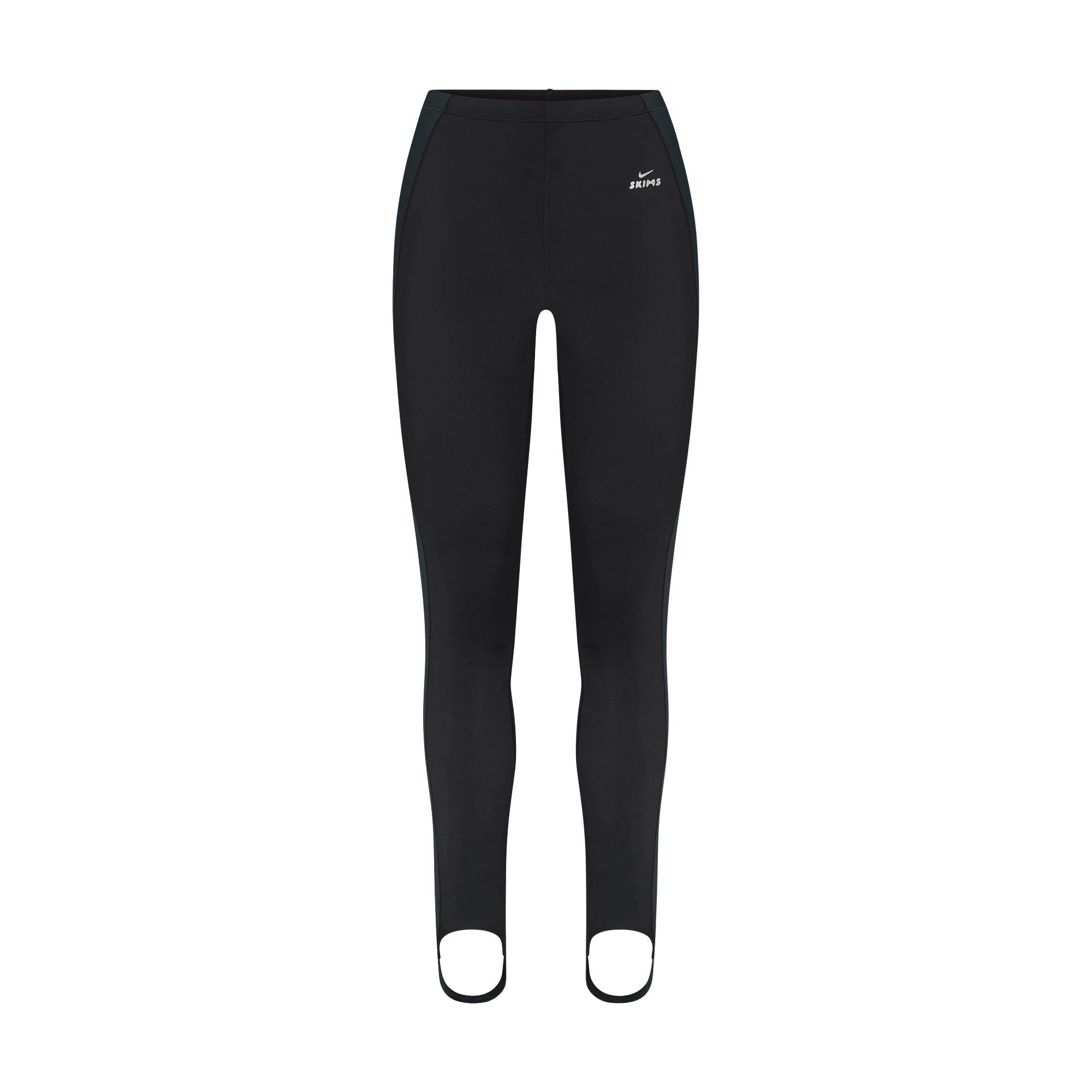 NikeSKIMS SHINE DRAWCORD STIRRUP 26" LEGGING | OBSIDIAN AND DARK TEAL FLAT ON A WHITE BACKGROUND | FLT