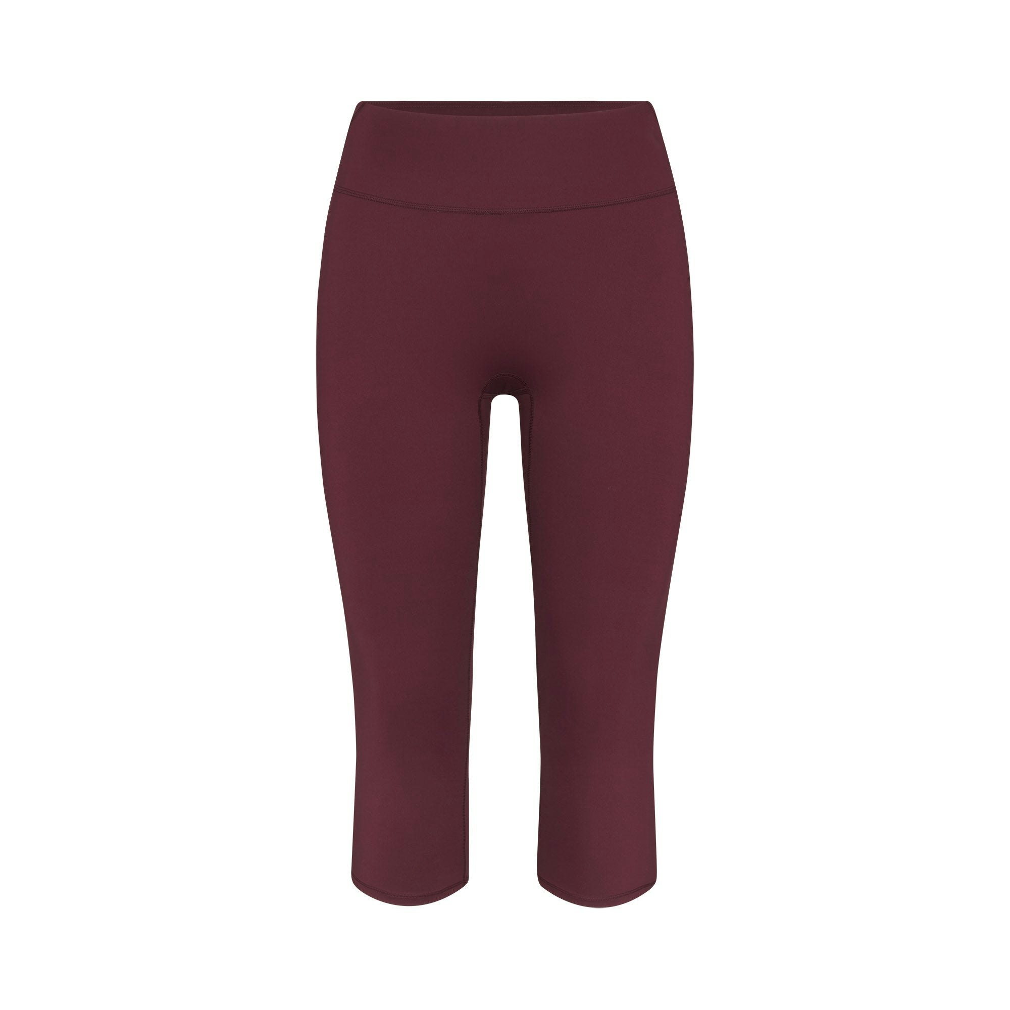 NikeSKIMS MATTE CROP 17" LEGGING | CURRANT FLAT ON A WHITE BACKGROUND | FLT