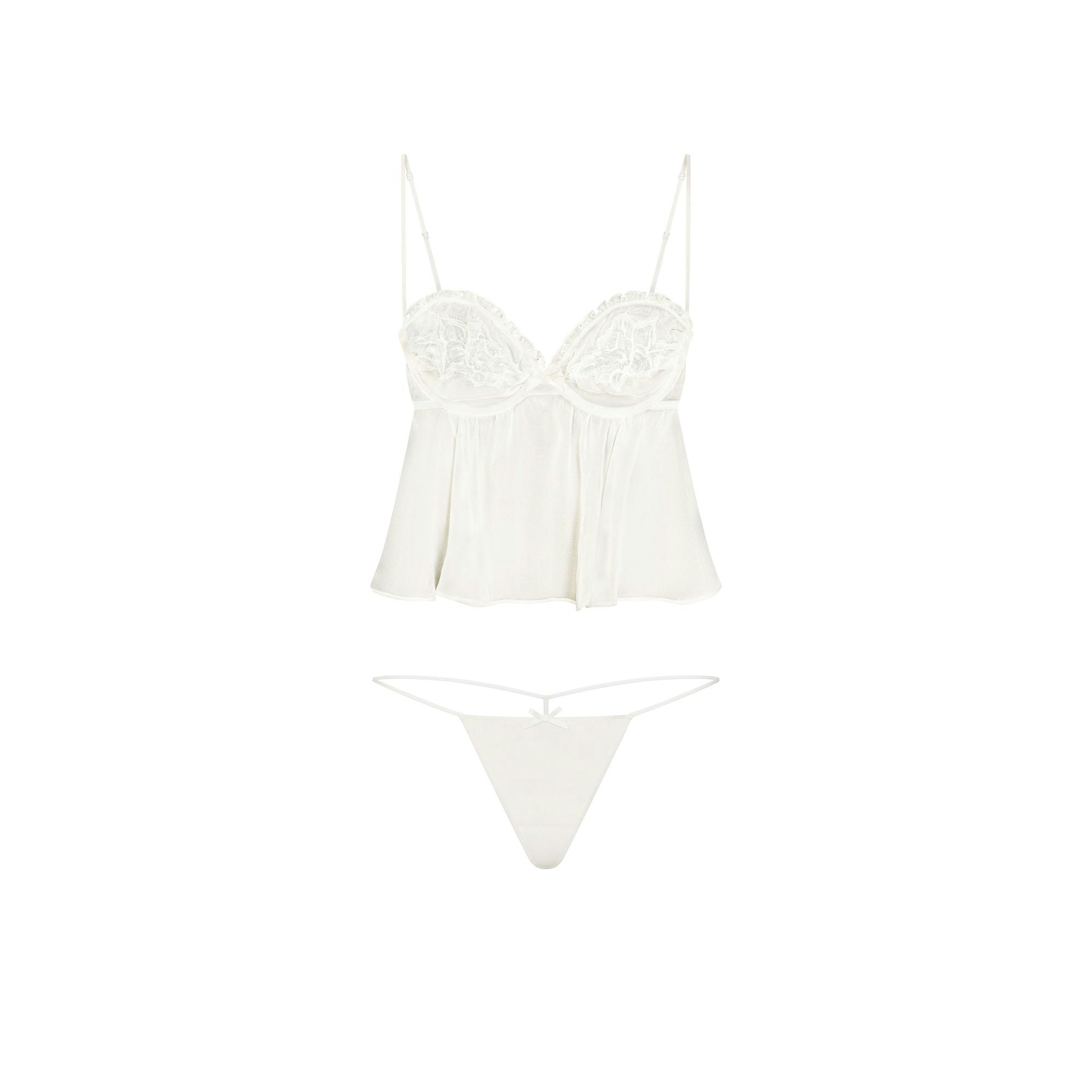 SKIMS ROMANCE BABYDOLL TOP AND STRING THONG SET | IVORY LAYS FLAT ON A WHITE BACKGROUND | FLT 