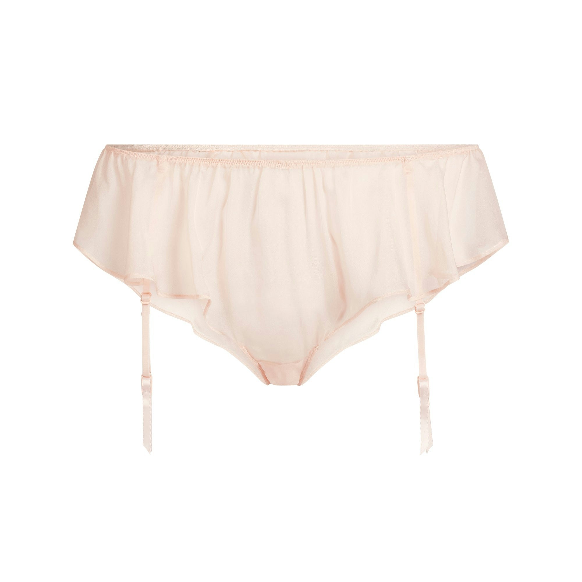 SKIMS ROMANCE BABYDOLL AND GARTER HIPSTER SET | PRIMROSE FLAT ON A WHITE BACKGROUND | FLT