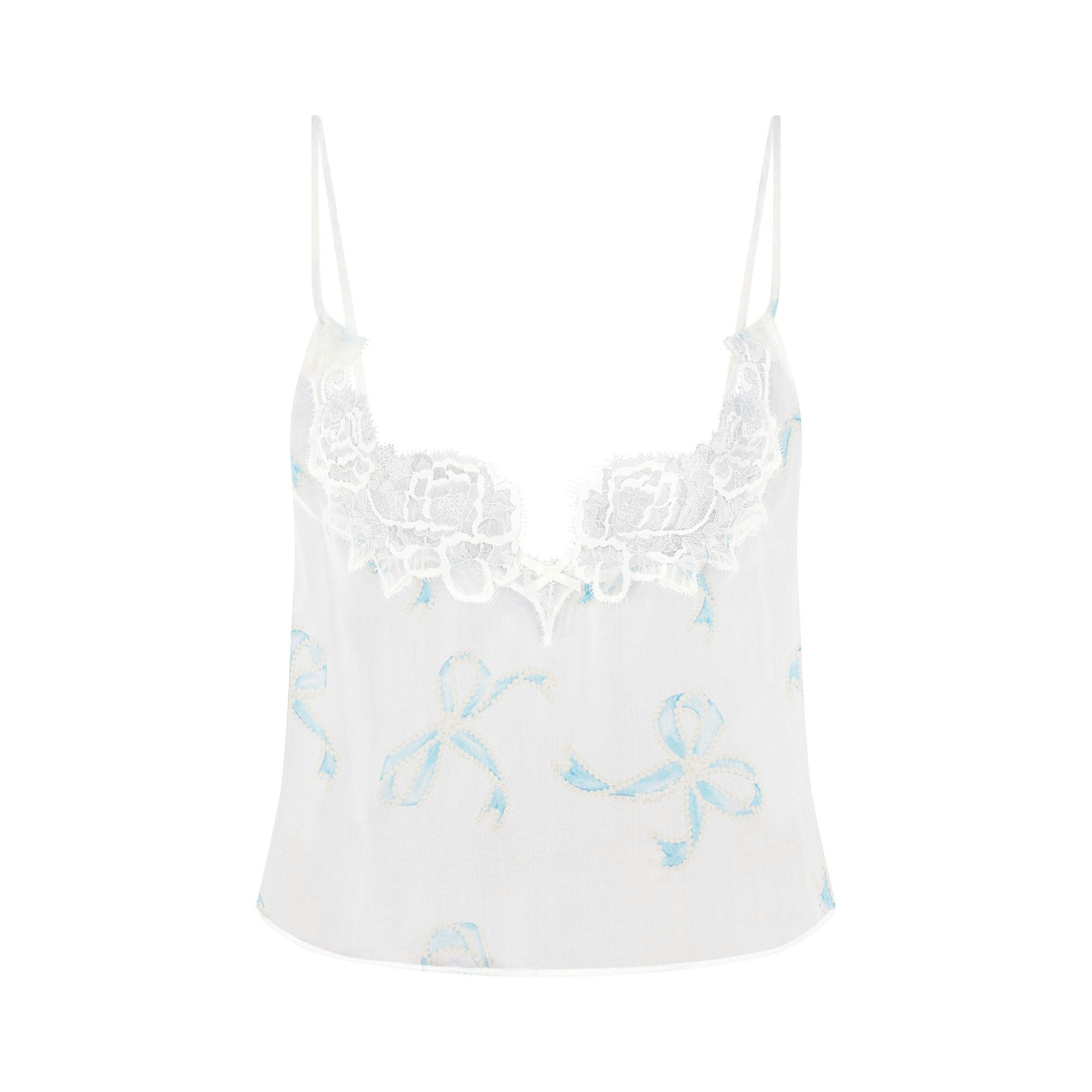 SKIMS ROMANCE CAMI AND SHORT SET | IVORY PEARL BOWS PRINT FLAT ON A WHITE BACKGROUND | FLT