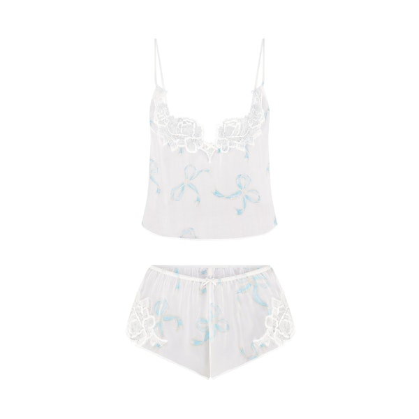 SKIMS ROMANCE CAMI AND SHORT SET | IVORY PEARL BOWS PRINT FLAT ON A WHITE BACKGROUND | FLT