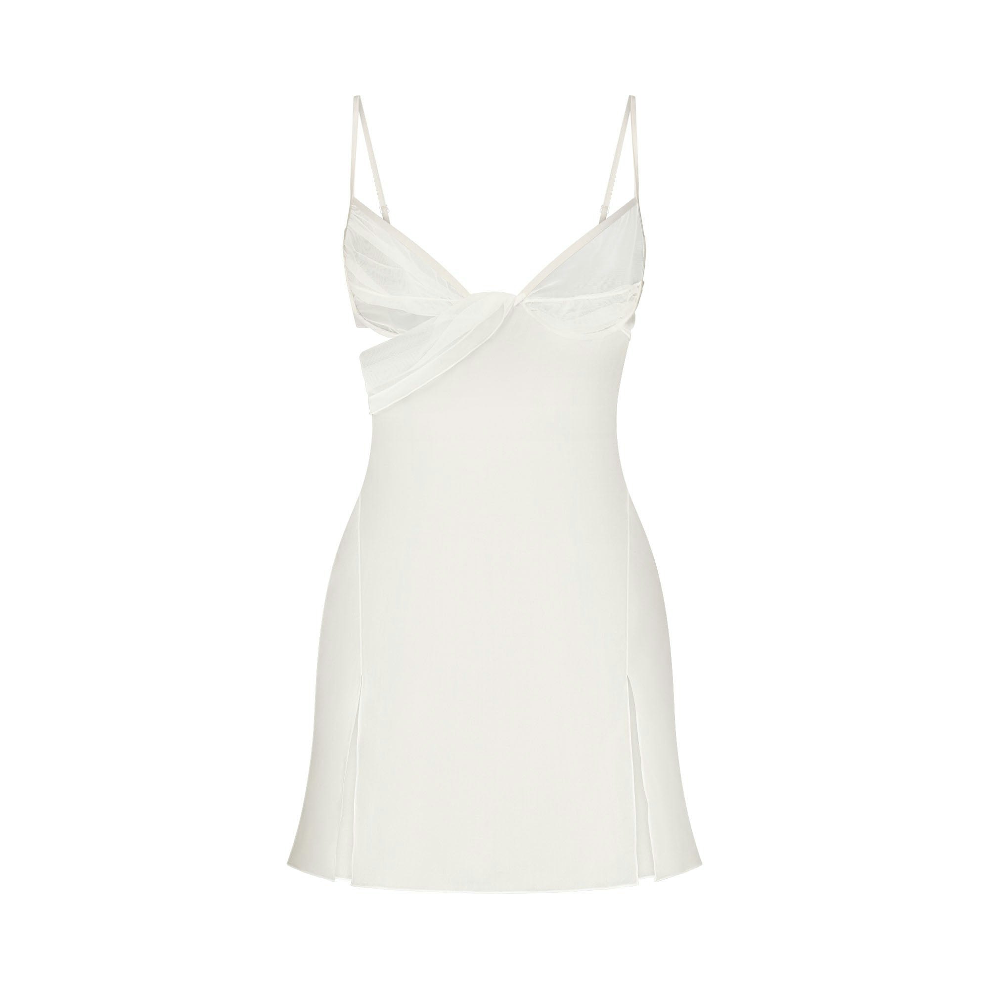 SKIMS ROMANCE DRAPED MINI SLIP DRESS | IVORY LAYS FLAT ON A WHITE BACKGROUND | FLT 
