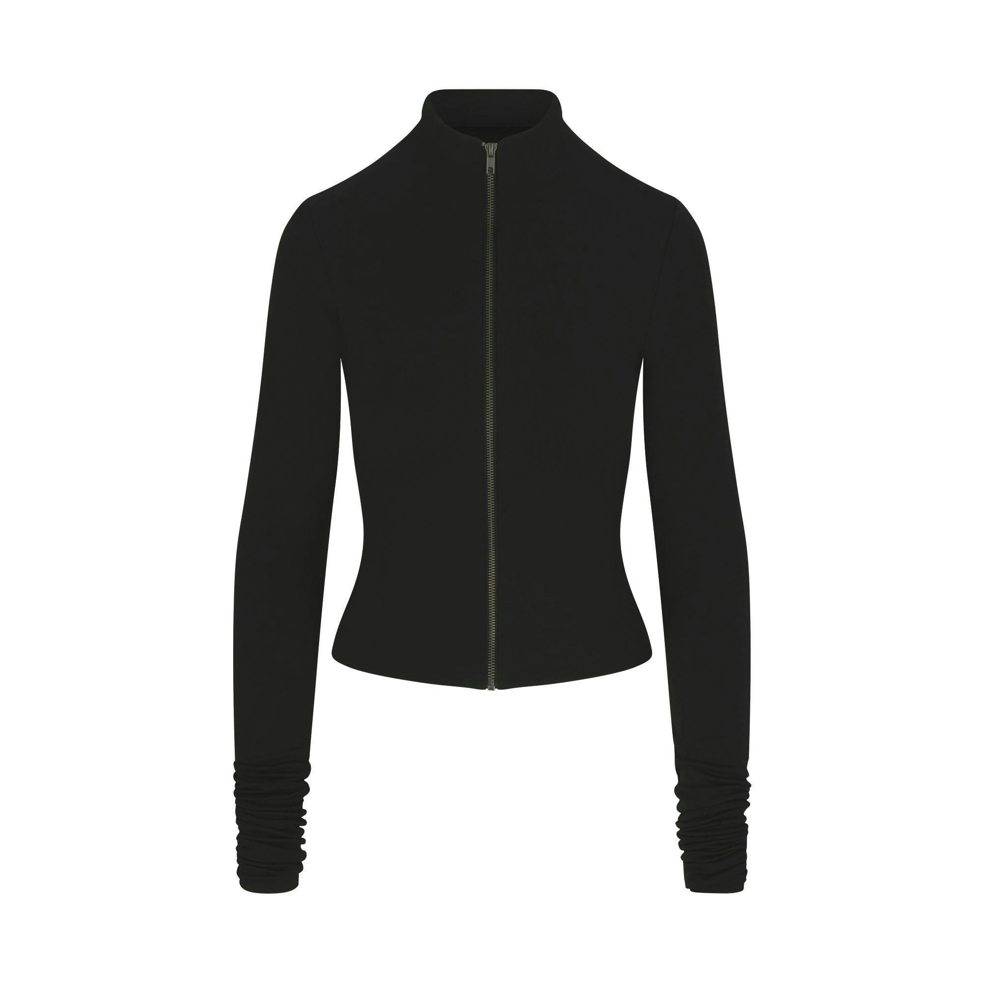 SKIMS CLOUD ZIP UP TOP | ONYX FLAT ON A WHITE BACKGROUND | FLT | FLT