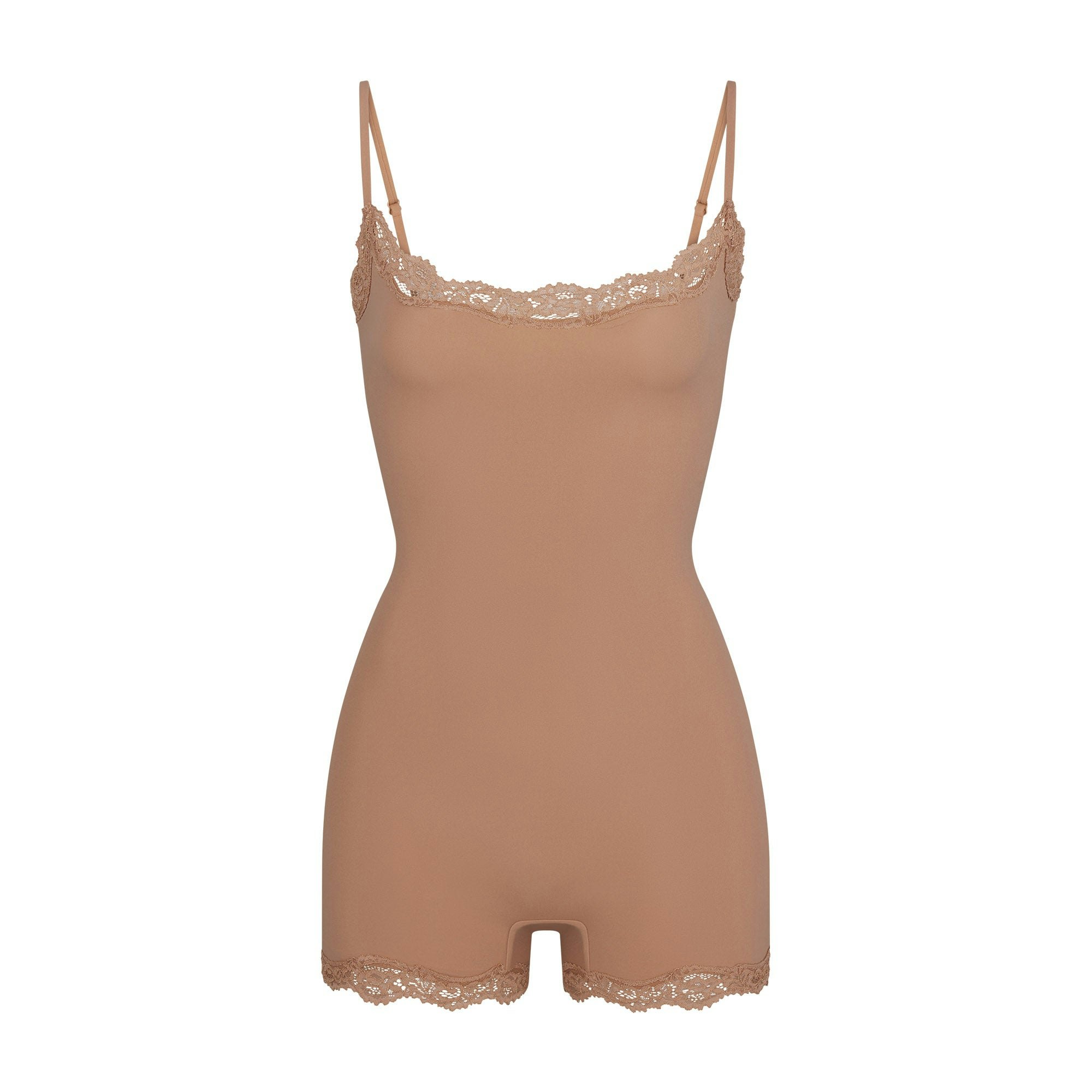 FITS EVERYBODY LACE ONESIE LAYS FLAT ON A WHITE BACKGROUND