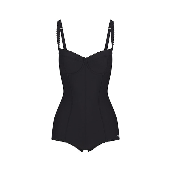 DOLCE&GABBANA X SKIMS SKIMS BODY SHORTIE BODYSUIT | ONYX (ONESIES) FLAT ON A WHITE BACKGROUND | FLT