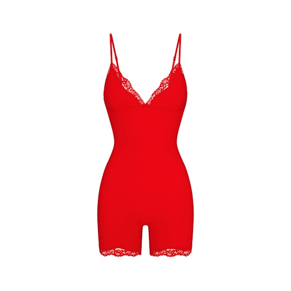 FITS EVERYBODY LACE TRIANGLE ONESIE | CAYENNE FLAT ON A WHITE BACKGROUND | FLT