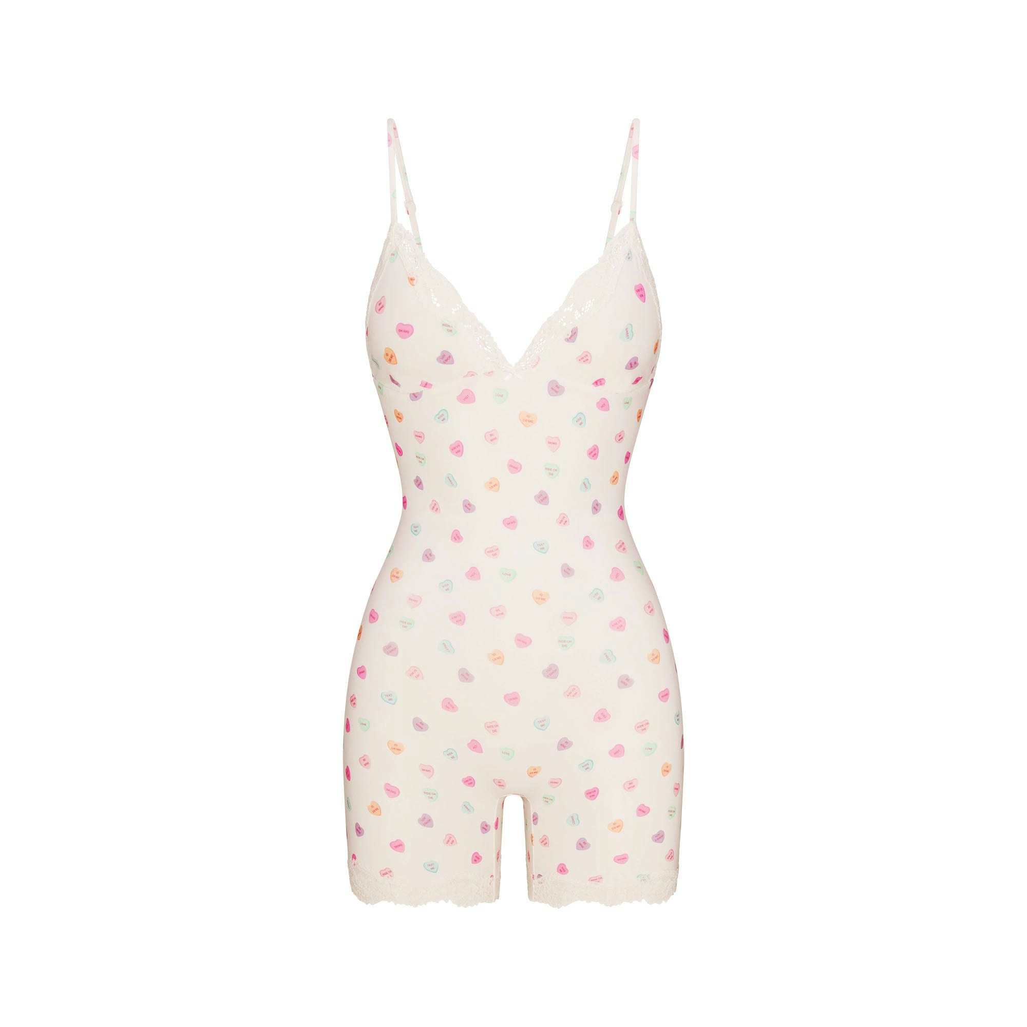 FITS EVERYBODY LACE TRIANGLE ONESIE | MARBLE CANDY HEART PRINT FLAT ON A WHITE BACKGROUND | FLT