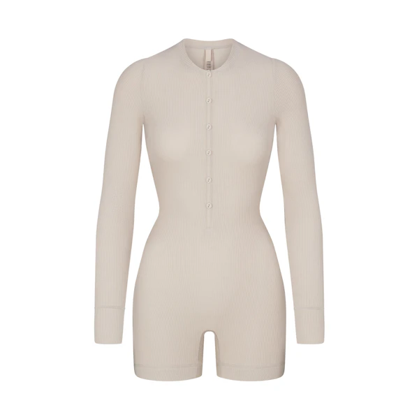 WAFFLE BUTTON UP HENLEY ONESIE LAYS FLAT ON A WHITE BACKGROUND