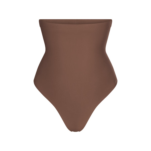SKIMS BODY CORE SCULPT HIGH-WAISTED THONG | JASPER FLAT ON A WHITE BACKGROUND | FLT | FLT