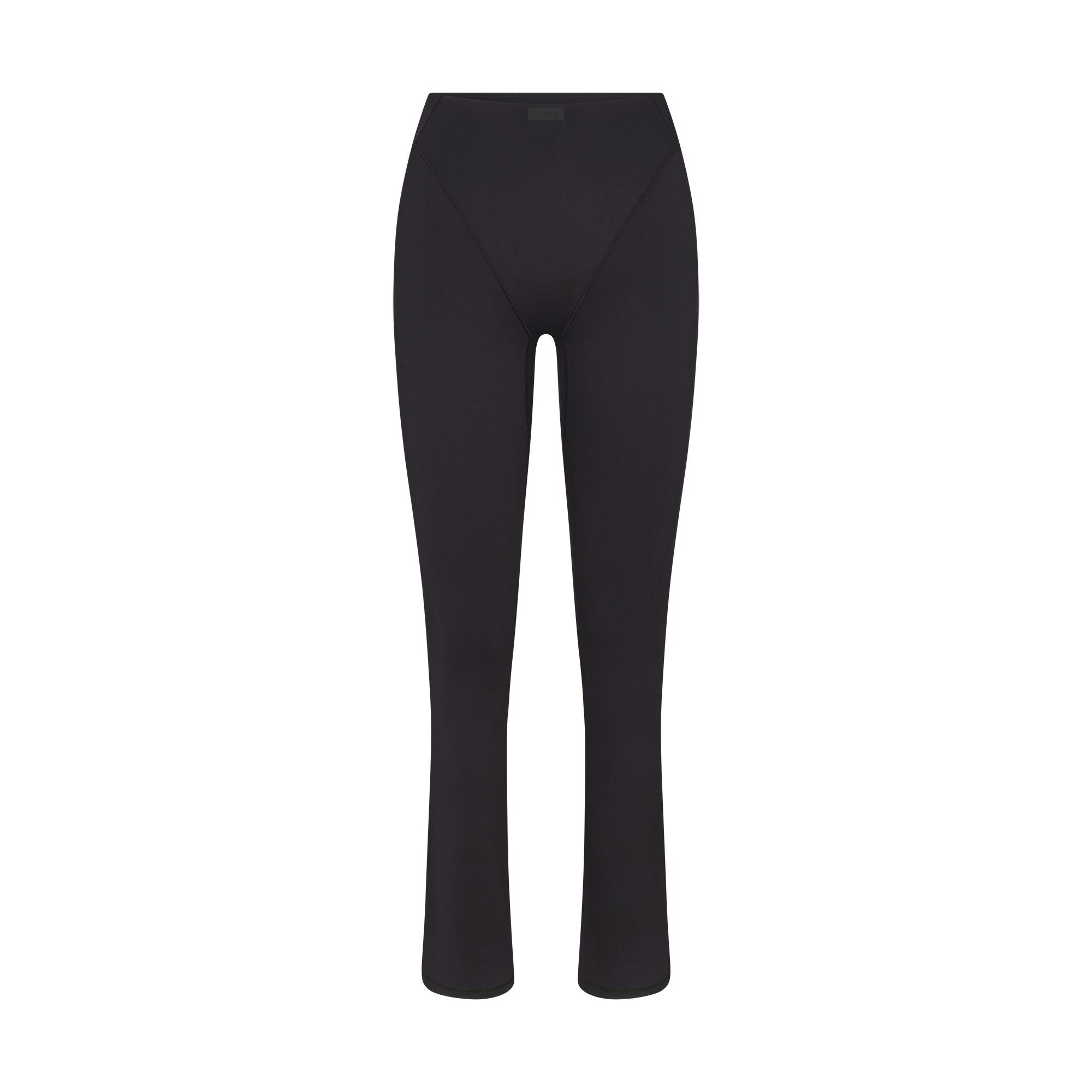NikeSKIMS MATTE V-LINE 39" STRAIGHT LEGGING | OBSIDIAN FLAT ON A WHITE BACKGROUND | FLT