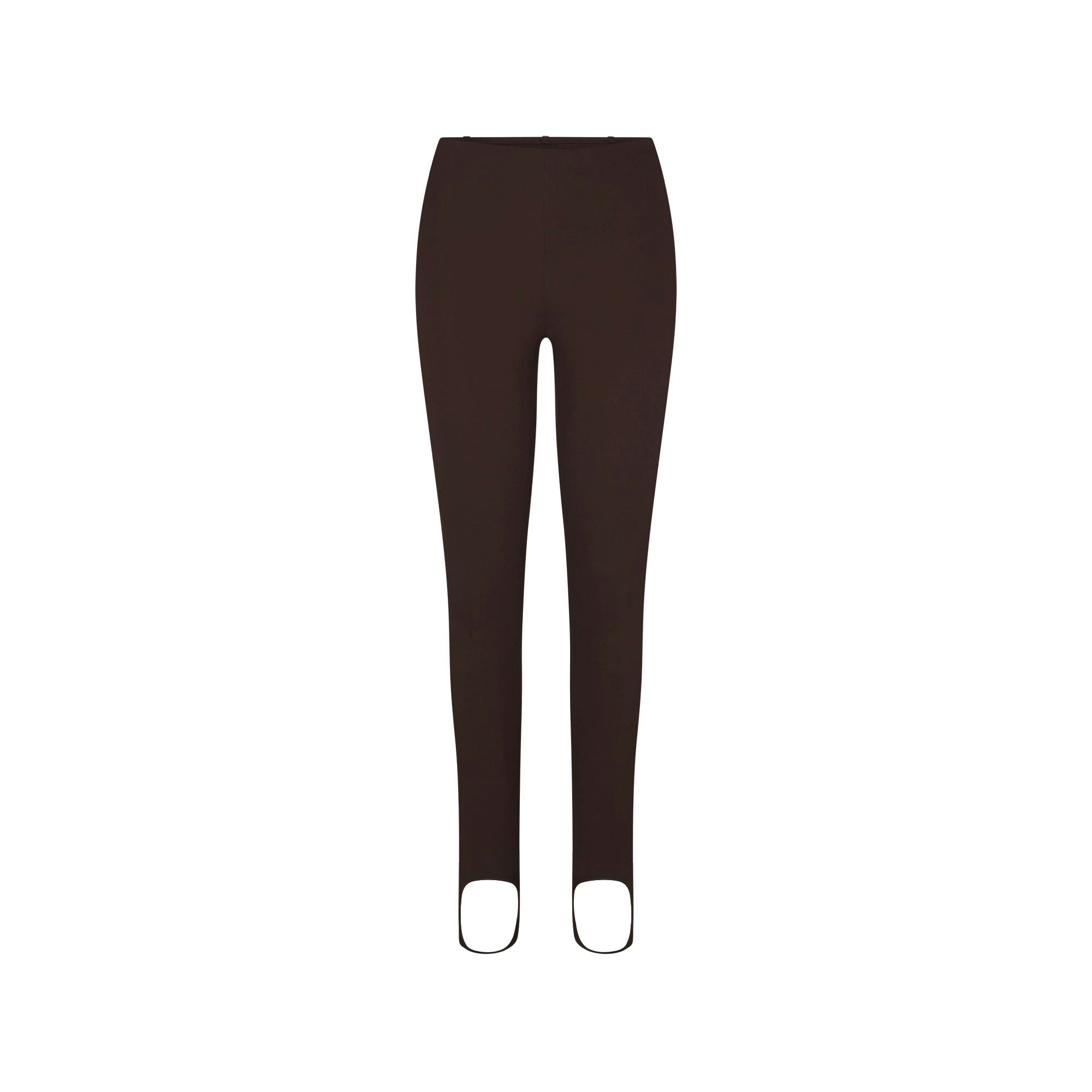 THE ESSENTIAL COLLECTION HIGH-WAISTED STIRRUP LEGGING | ESPRESSO FLAT ON A WHITE BACKGROUND | FLT
