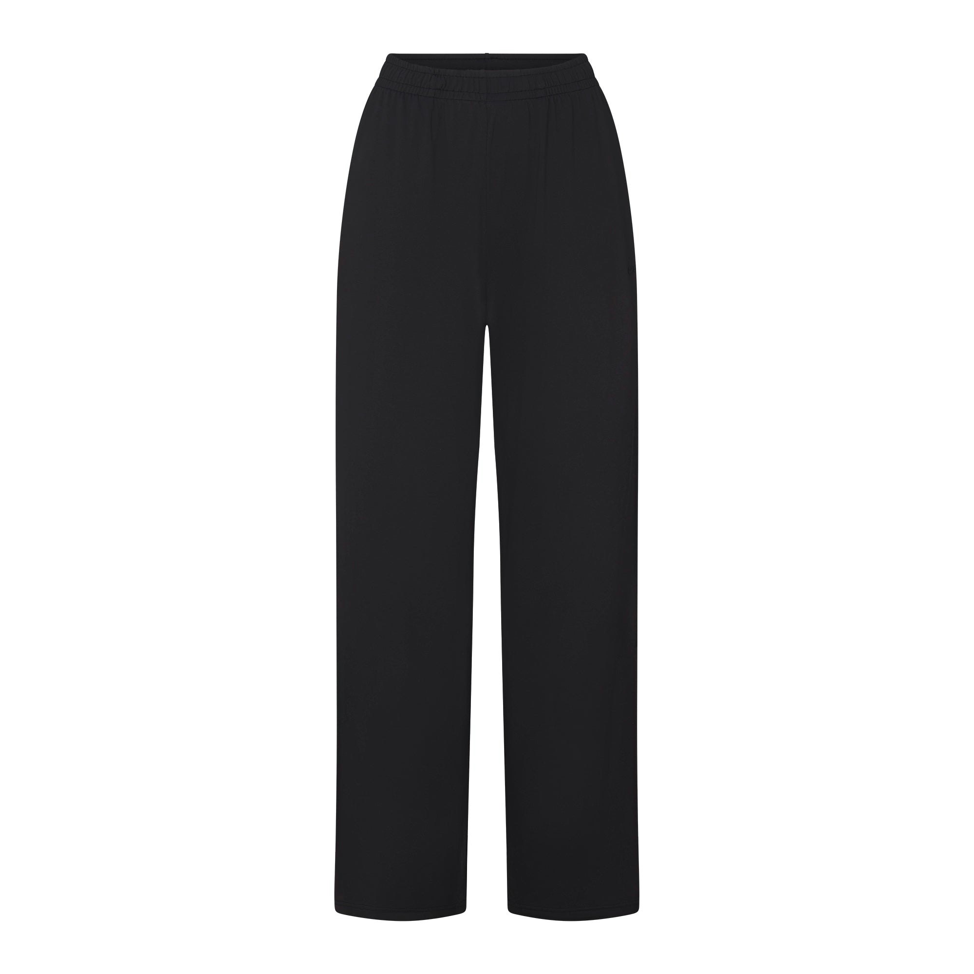 NikeSKIMS AIRY WIDE LEG PANT | OBSIDIAN FLAT ON A WHITE BACKGROUND | FLT