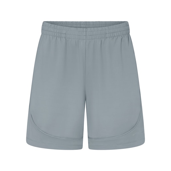 NikeSKIMS AIRY RELAXED SHORT | WASHED PACIFIC FLAT ON A WHITE BACKGROUND | FLT