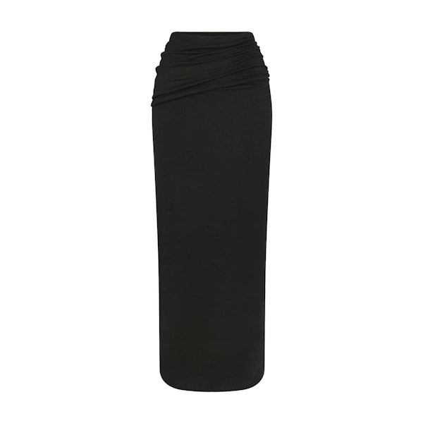 SKIMS CLOUD FOLDOVER SKIRT | ONYX FLAT ON A WHITE BACKGROUND | FLT | FLT