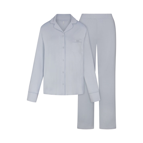 SKIMS SLEEP LONG SLEEVE BUTTON UP SET | ZEN BLUE FLAT ON A WHITE BACKGROUND | FLT
