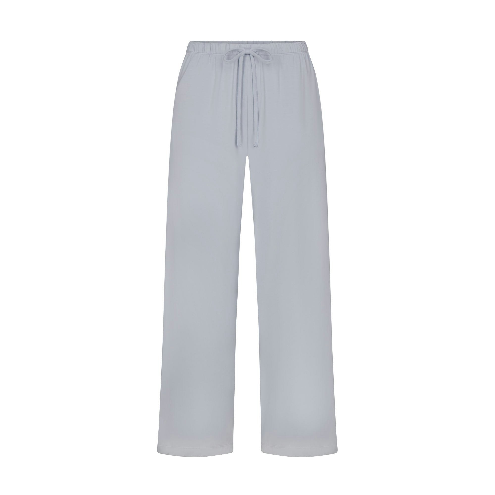 SKIMS SLEEP CROPPED LONG SLEEVE AND PANT SET | ZEN BLUE FLAT ON A WHITE BACKGROUND | FLT