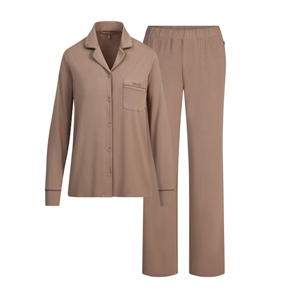 SKIMS SLEEP LONG SLEEVE BUTTON UP SET | FOSSIL FLAT ON A WHITE BACKGROUND | FLT
