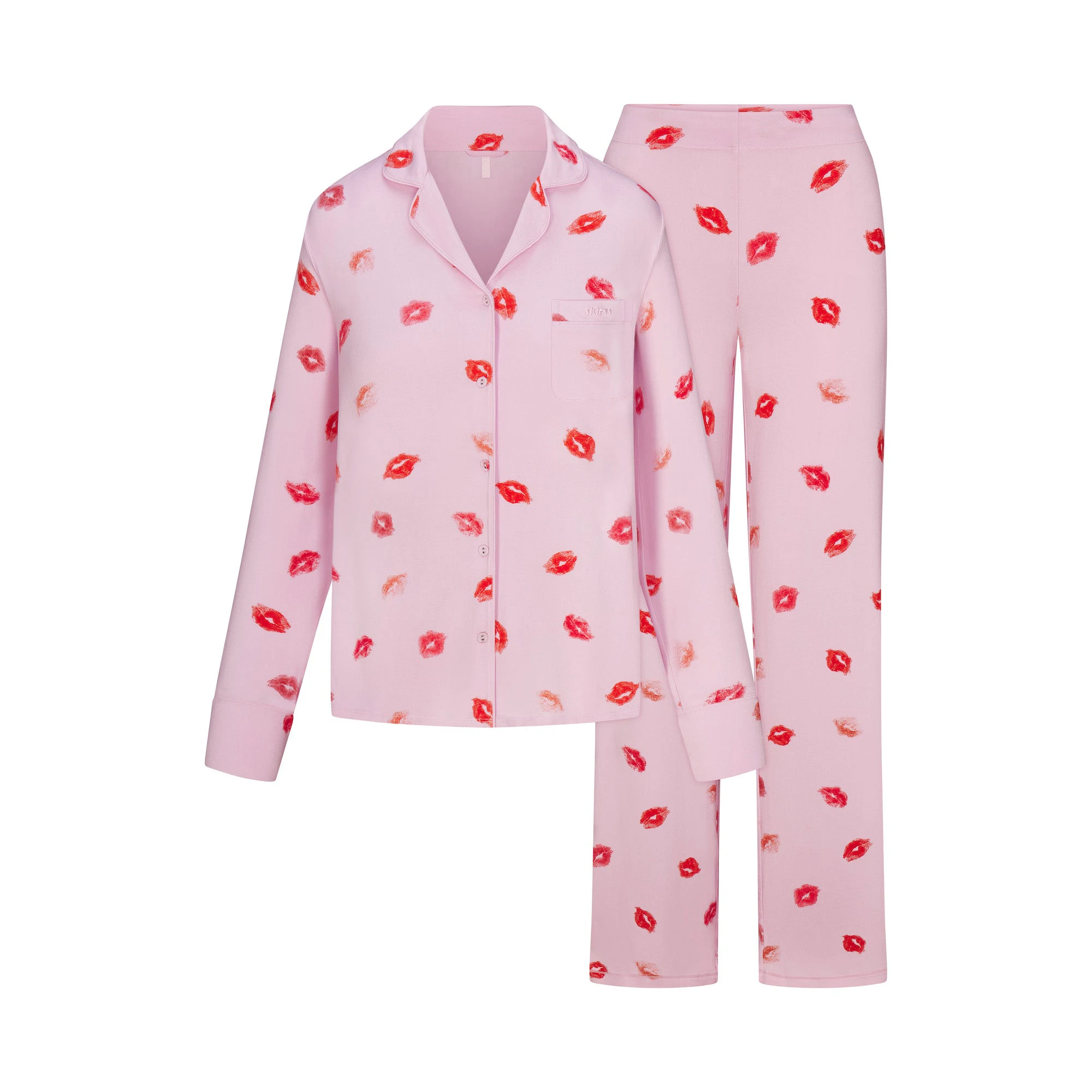 SKIMS SLEEP LONG SLEEVE BUTTON UP SET | CHERRY BLOSSOM LIPSTICK FLAT ON A WHITE BACKGROUND | FLT