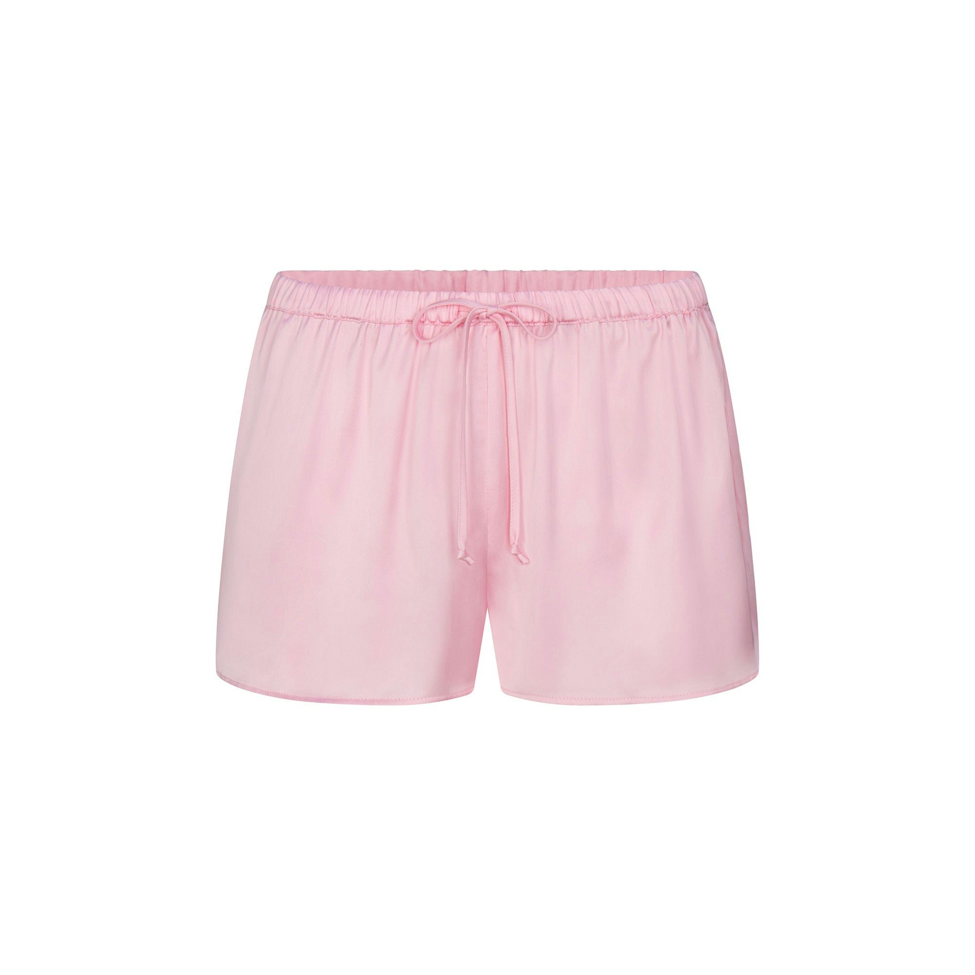 SKIMS HOTEL SHINE CAMI SLEEP SET | BABY PINK ON A MODEL FRONT VIEW