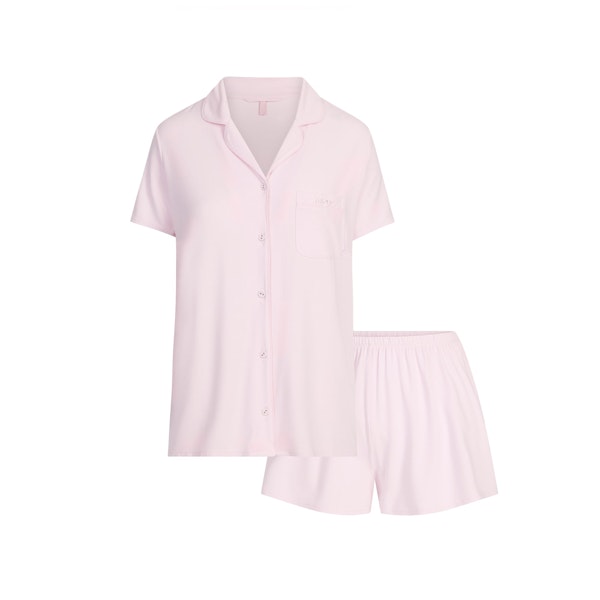 SKIMS SLEEP SHORT SLEEVE BUTTON UP SET | BLOOM FLAT ON A WHITE BACKGROUND | FLT