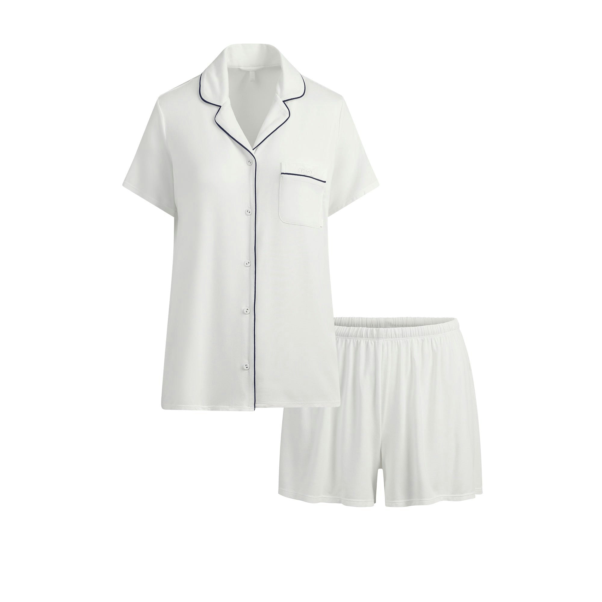 SKIMS SLEEP SHORT SLEEVE BUTTON UP SET | MARBLE CONTRAST FLAT ON A WHITE BACKGROUND | FLT