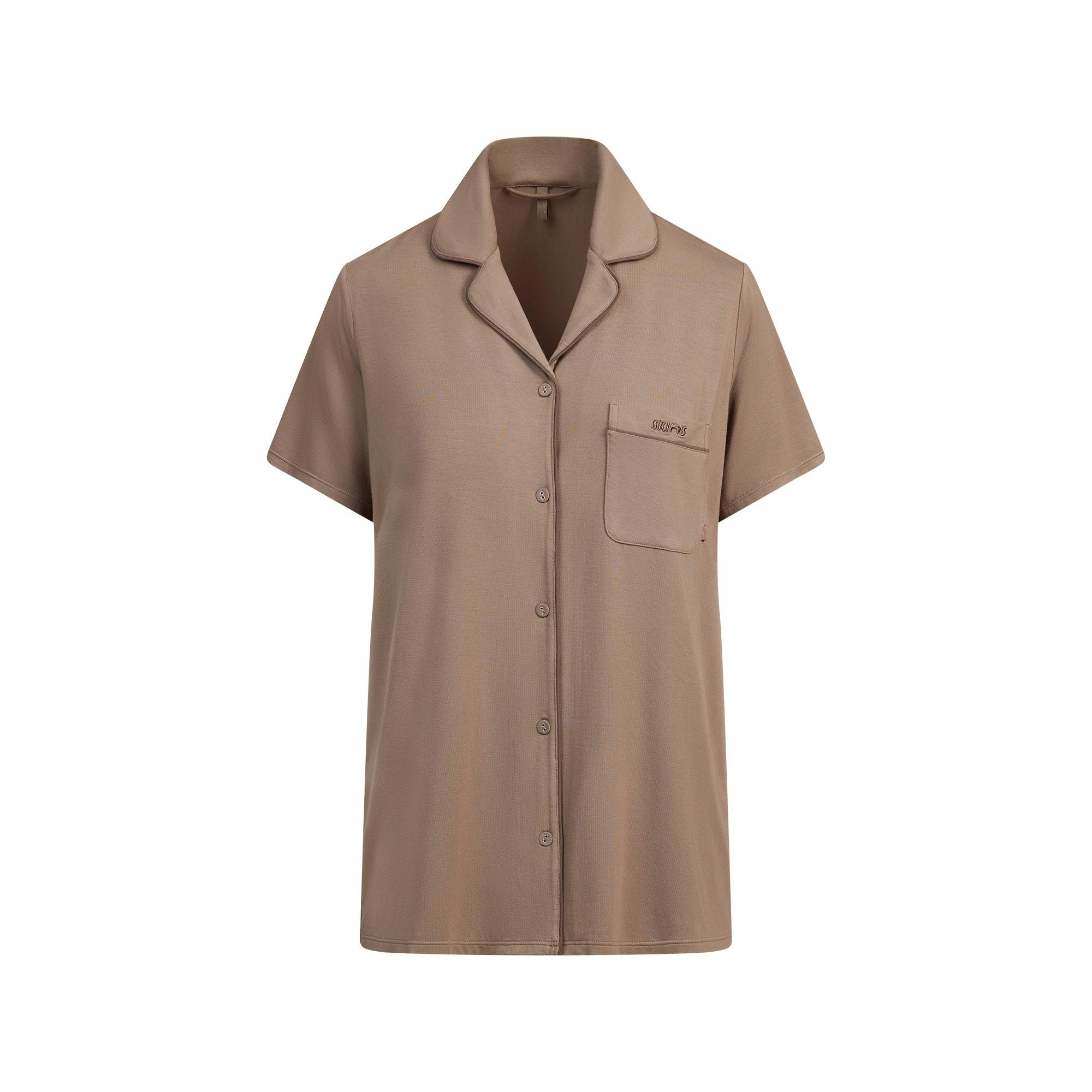 SKIMS SLEEP SHORT SLEEVE BUTTON UP SET | FOSSIL FLAT ON A WHITE BACKGROUND | FLT