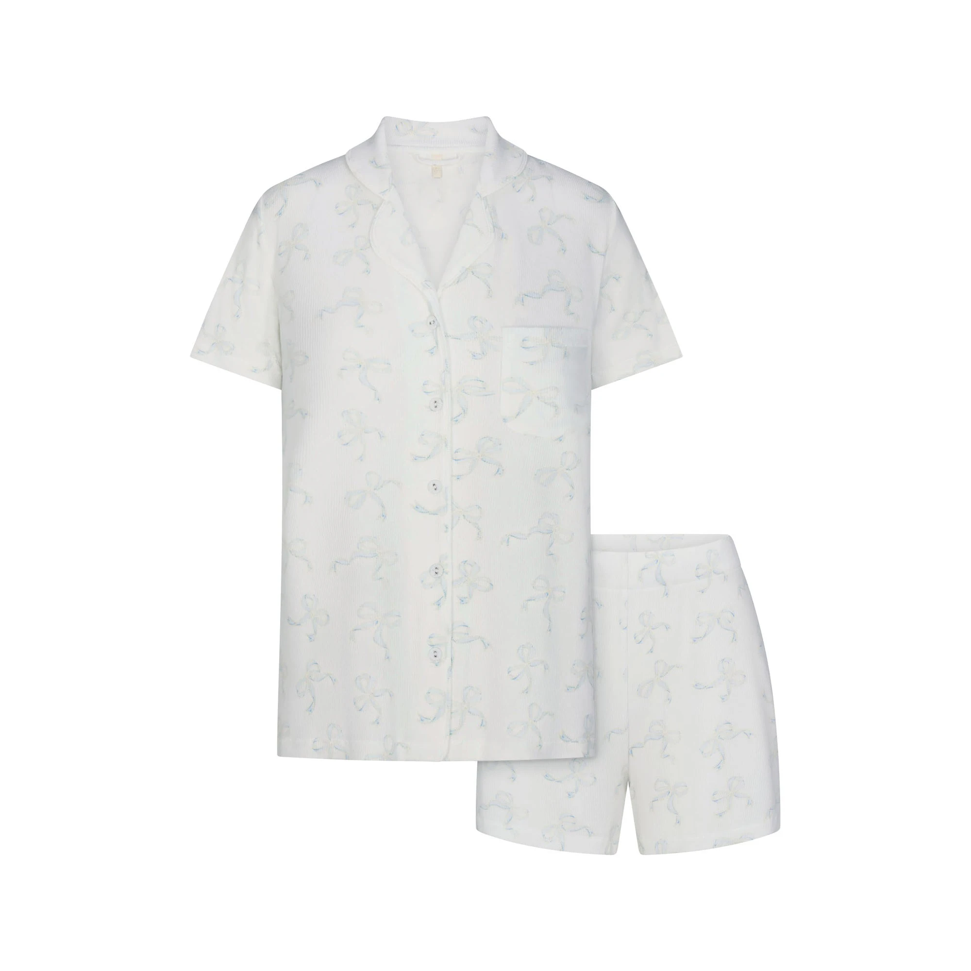 SOFT LOUNGE SHORT SLEEP SET | IVORY PEARL BOWS PRINT LAYS FLAT ON A WHITE BACKGROUND | FLT