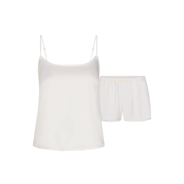 WOVEN SHINE CAMI AND SHORT SLEEP SET | IVORY LAYS FLAT ON A WHITE BACKGROUND | FLT 