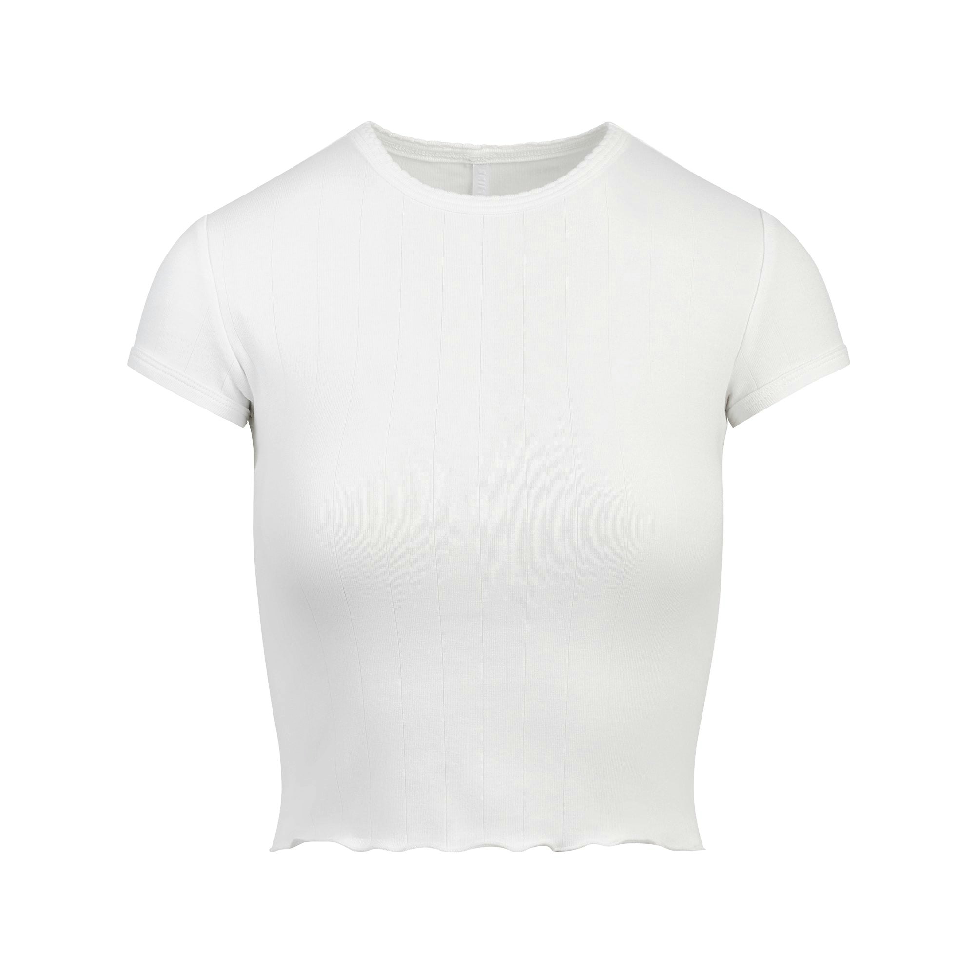 DROP NEEDLE POINTELLE BABY TEE | SNOW FLAT ON A WHITE BACKGROUND | FLT