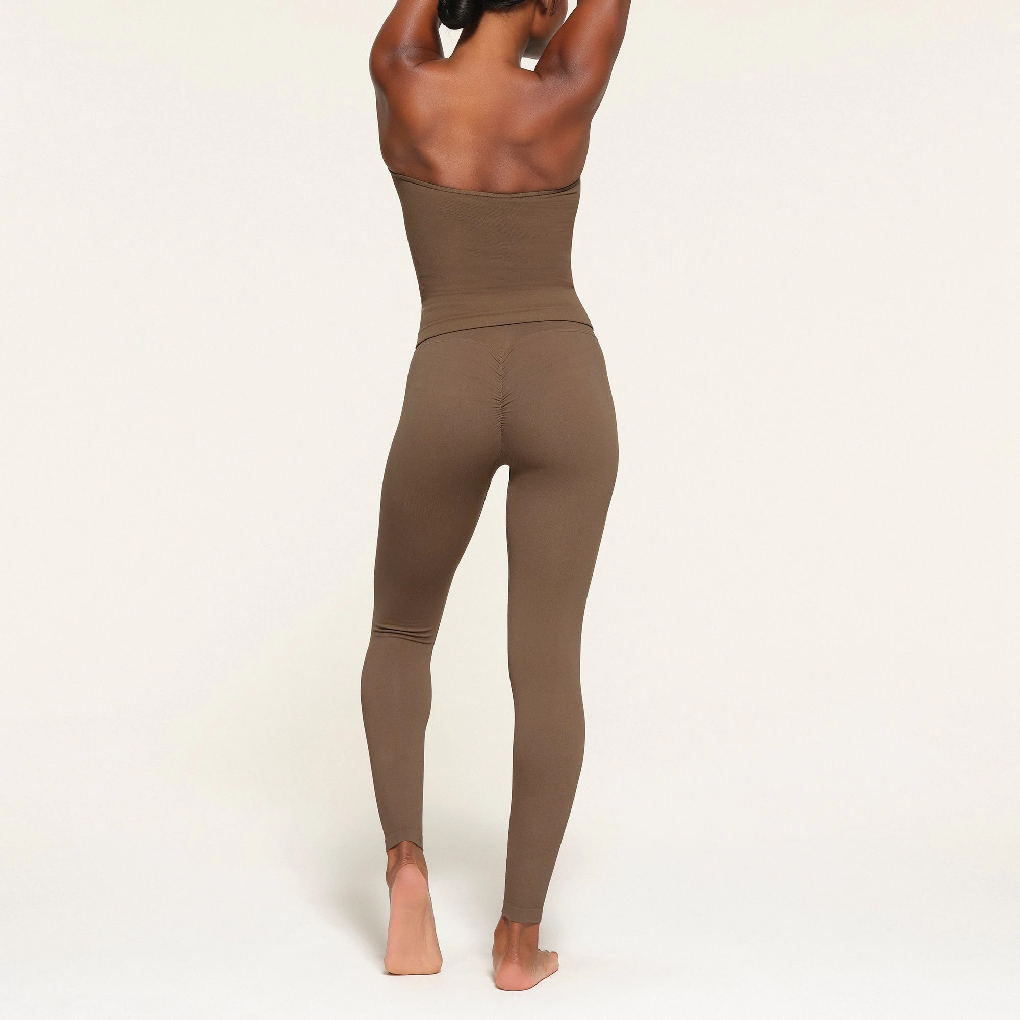 CONTOUR LOUNGE TUBE TOP ON A MODEL BACK VIEW