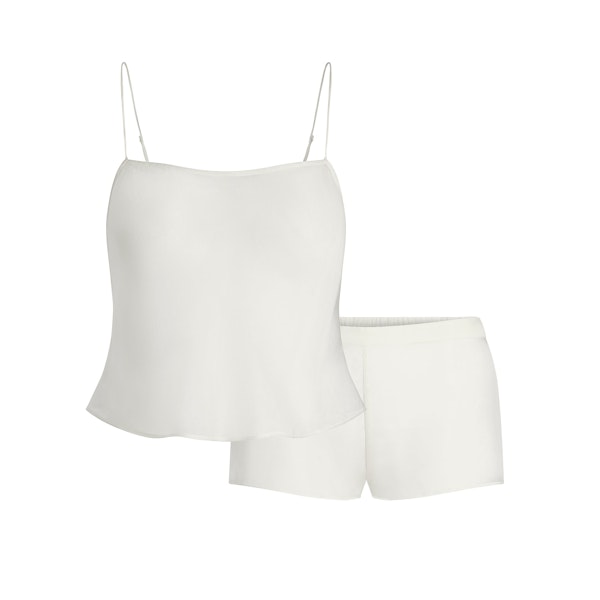 SKIMS ROMANCE CAMI AND SHORT SET | IVORY FLAT ON A WHITE BACKGROUND | FLT