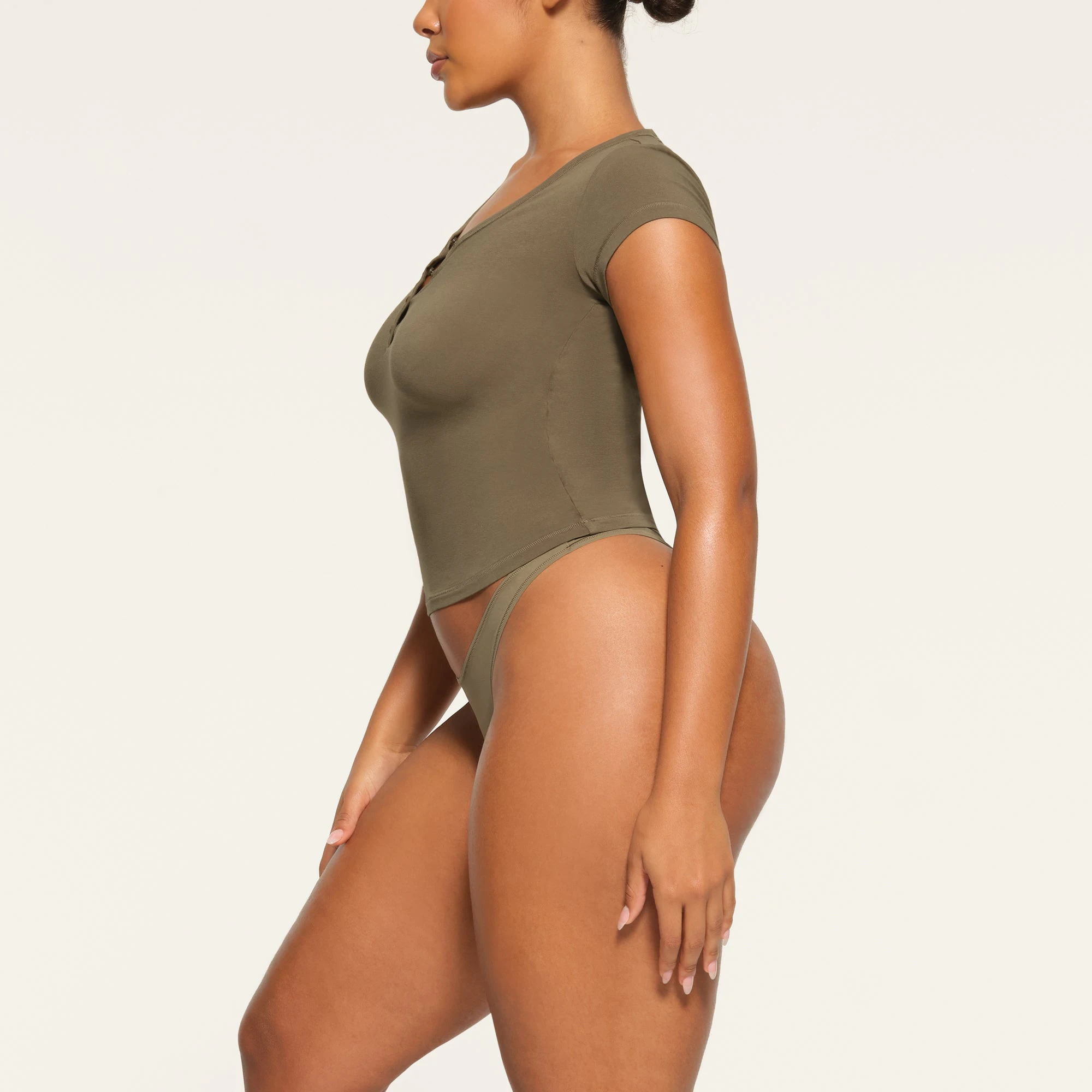 NEW VINTAGE HENLEY T-SHIRT WORN BY A MODEL IN SIDE VIEW