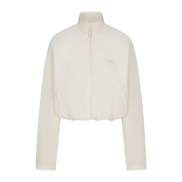OUTDOOR FLEECE HALF ZIP PULLOVER | ECRU FLAT ON A WHITE BACKGROUND | FLT